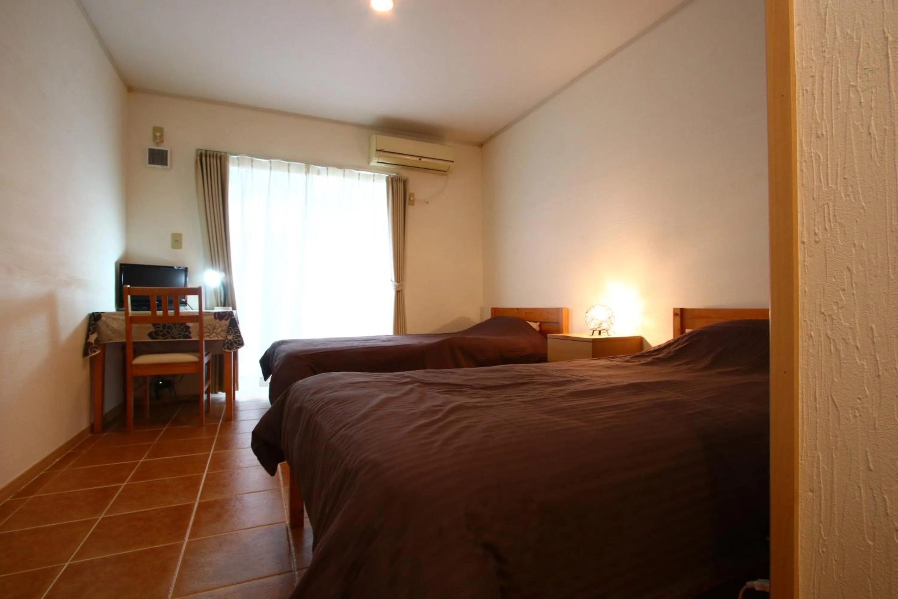 Bed in AsobiBASE Yamabare-House