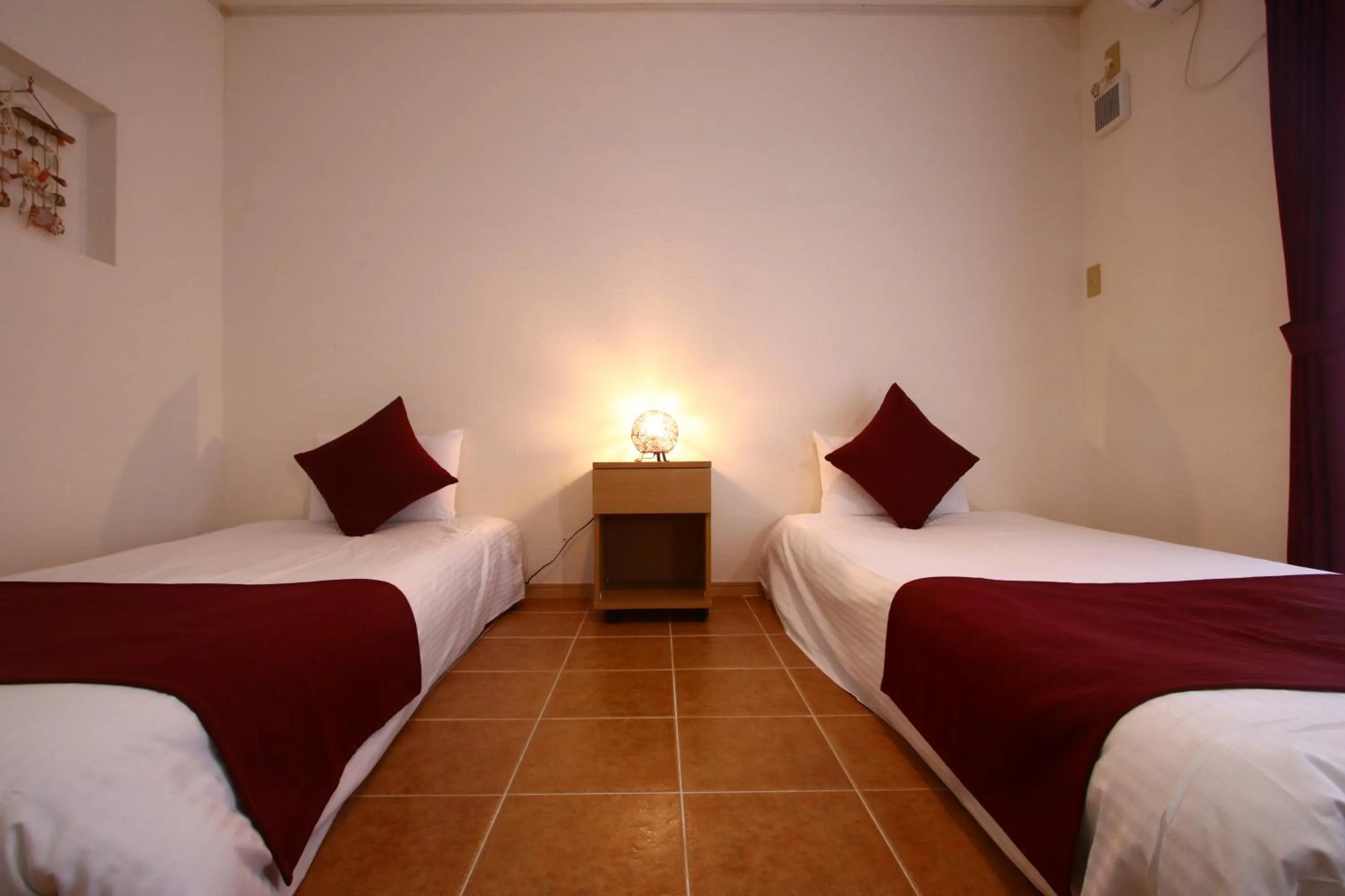 Bed in AsobiBASE Yamabare-House