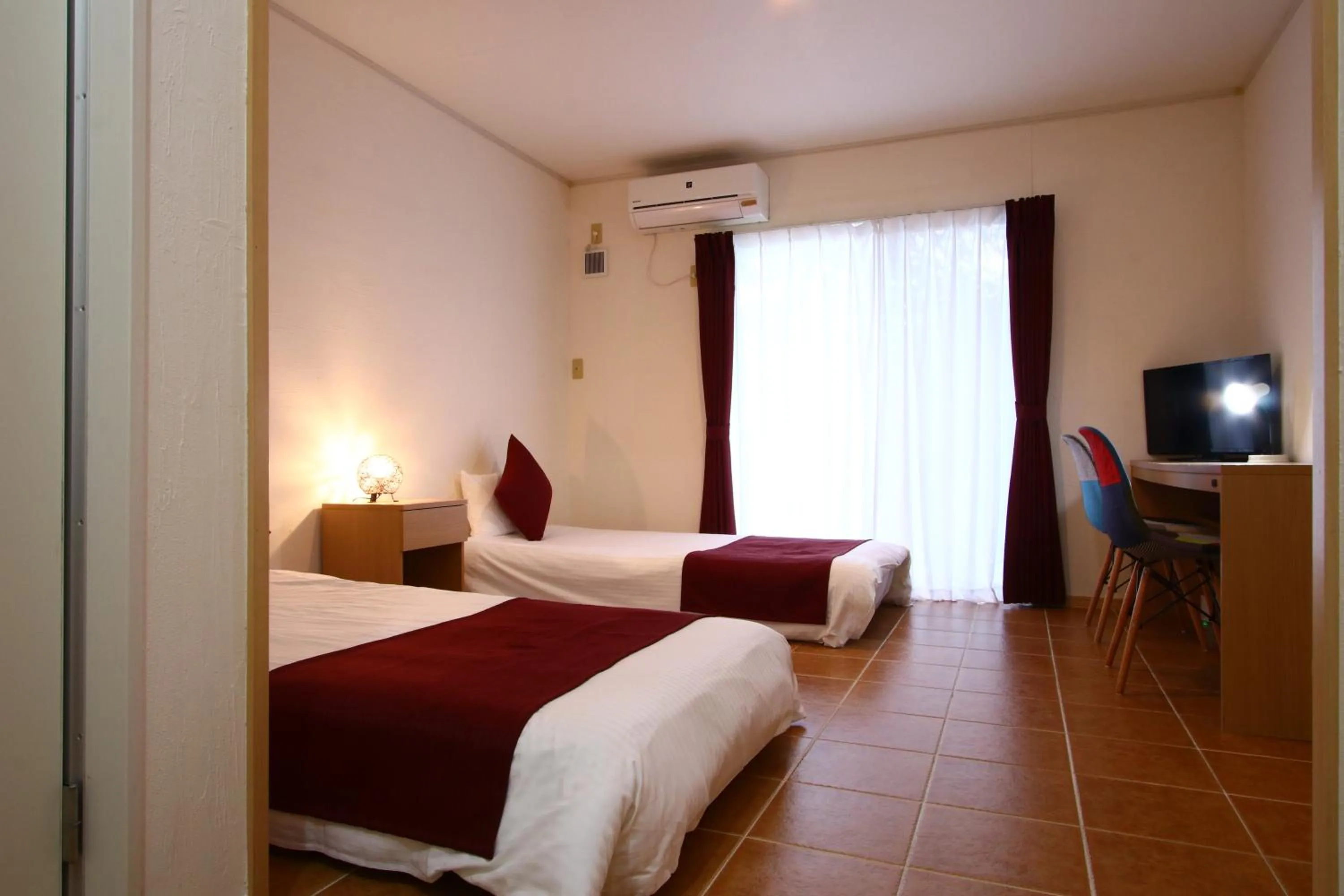 Bed in AsobiBASE Yamabare-House