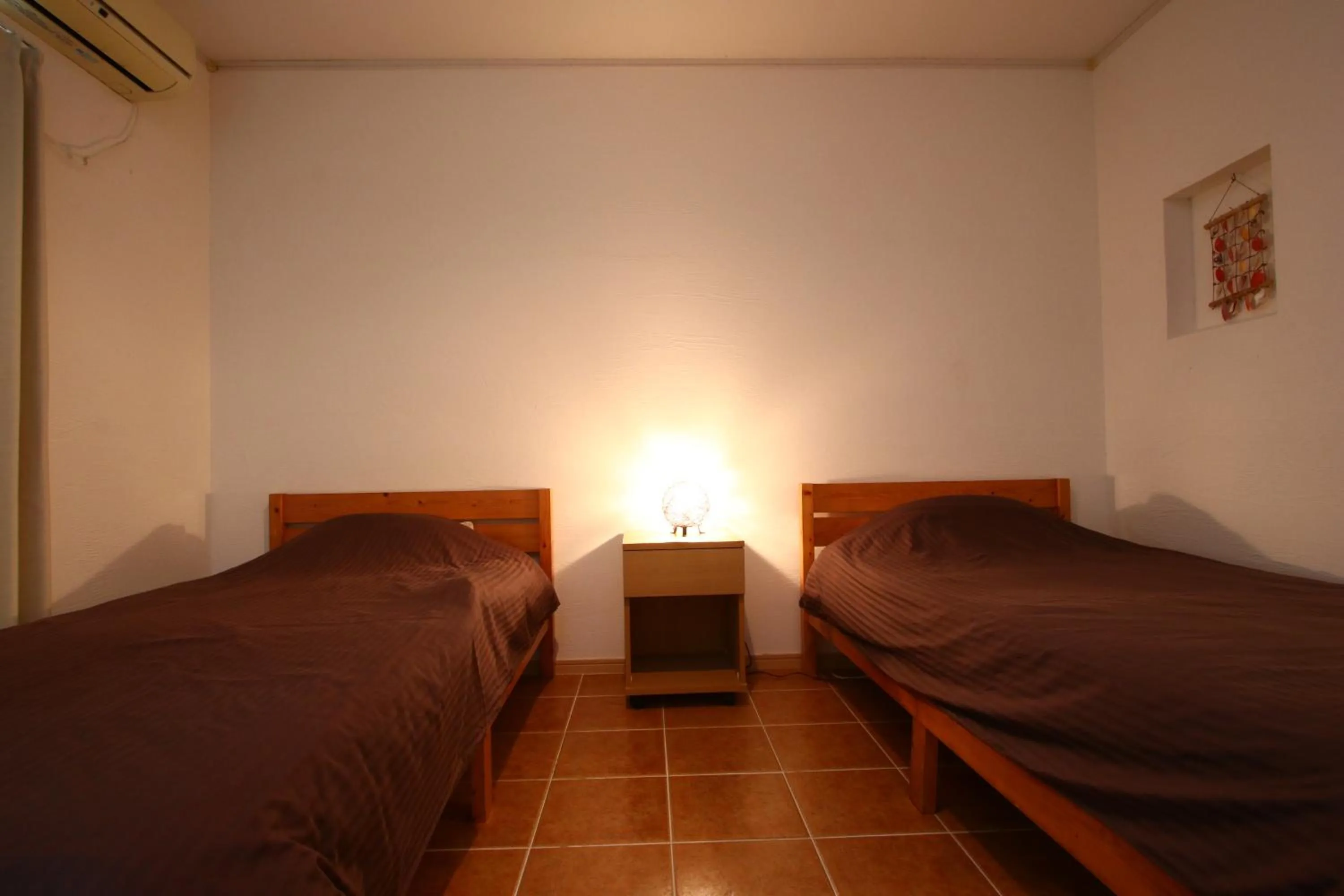 Bed in AsobiBASE Yamabare-House