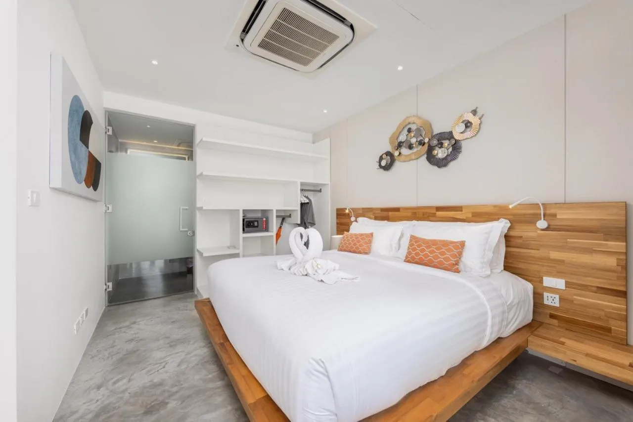 Bed in UniQue BoutiQue Resort