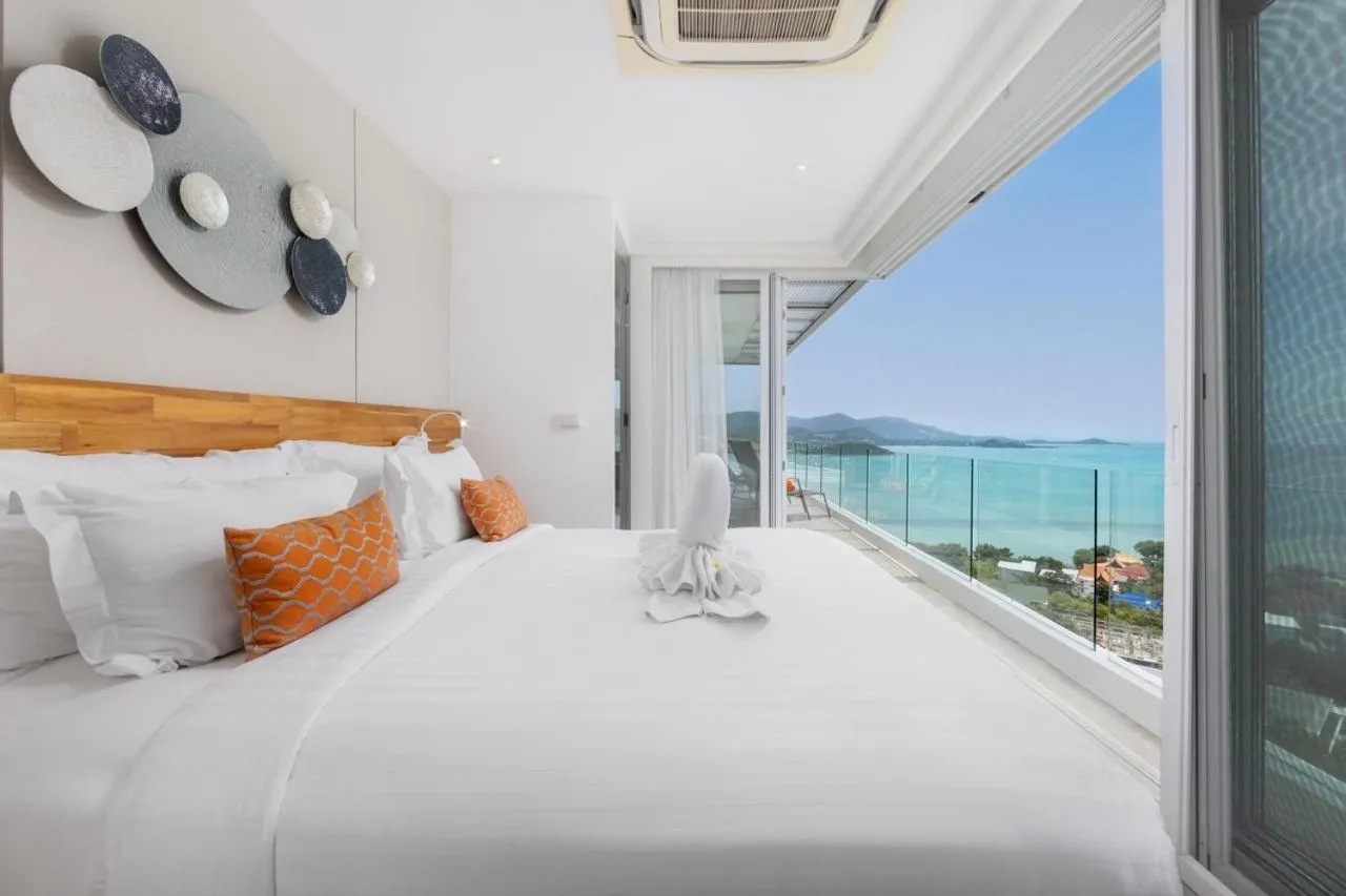 Bed in UniQue BoutiQue Resort