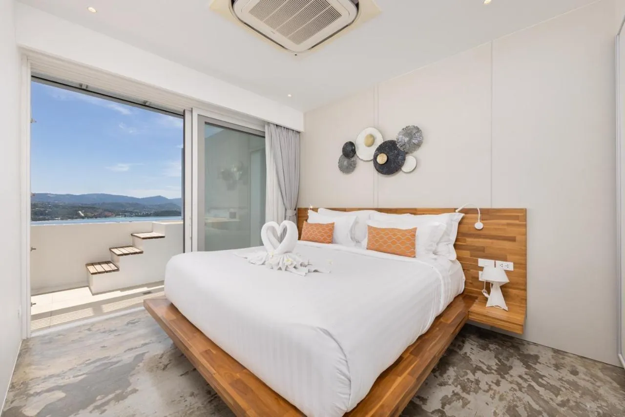 Bed in UniQue BoutiQue Resort