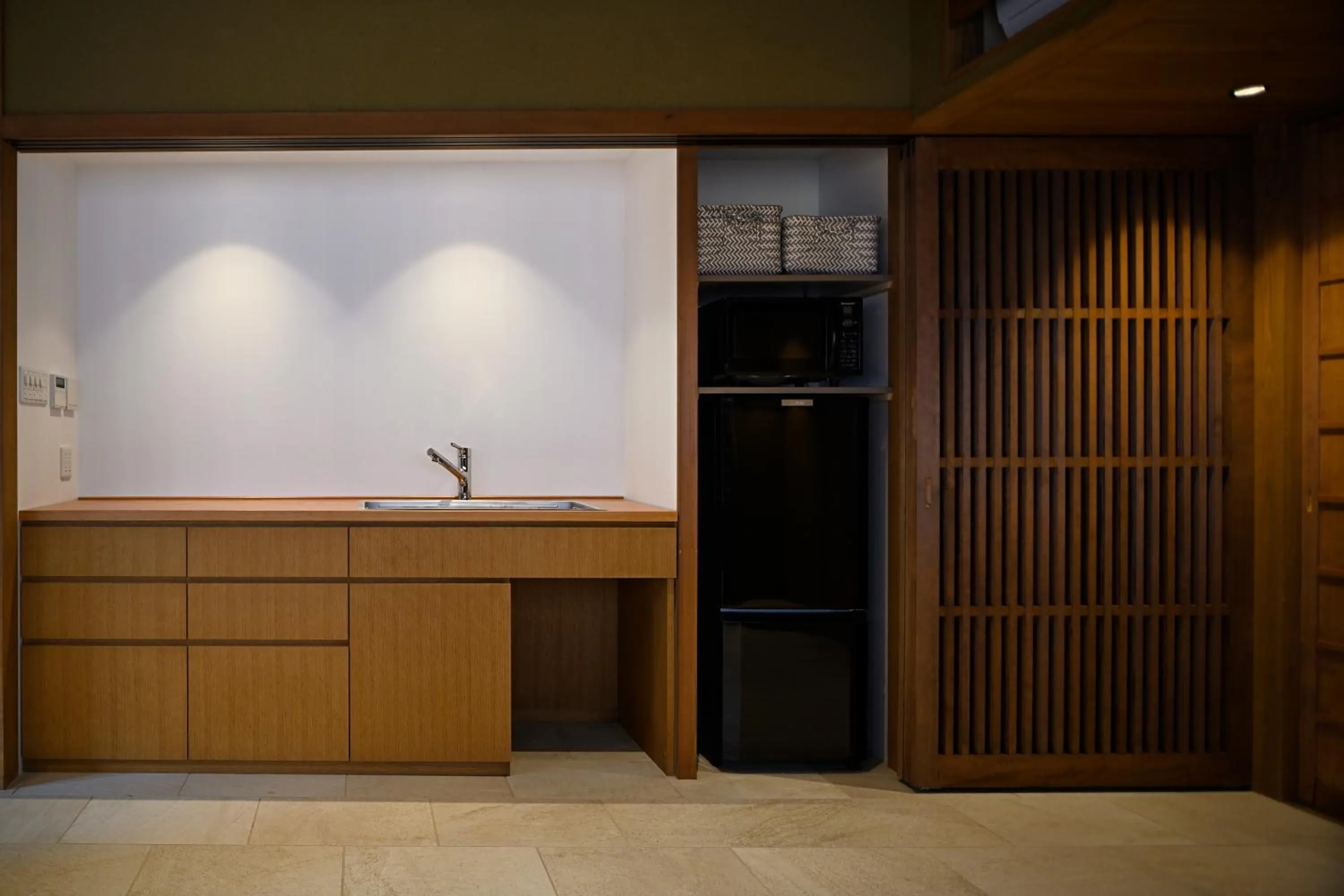 Communal lounge/ TV room in Nishijin Fujita