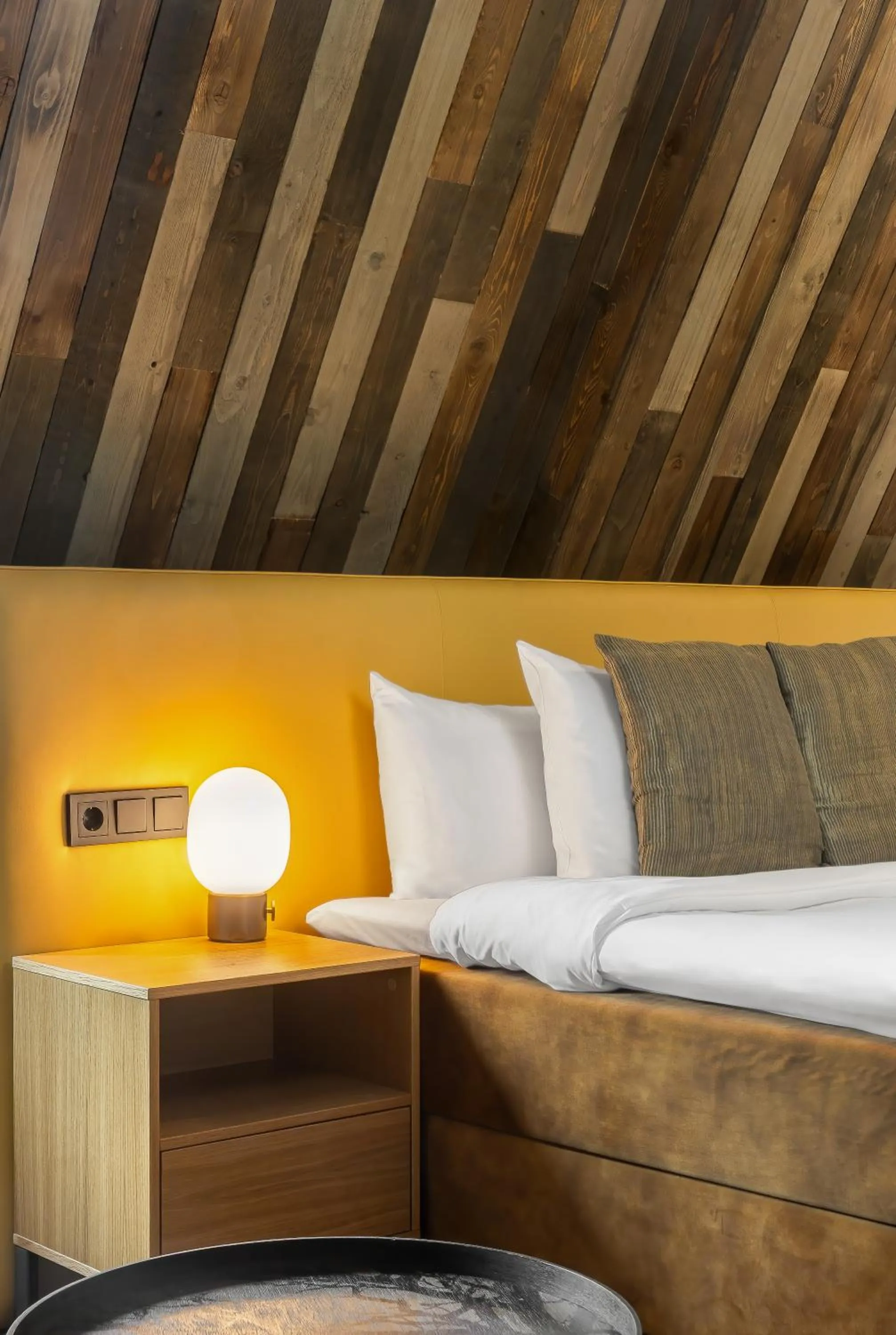 Decorative detail, Bed in Cityhotel Wood