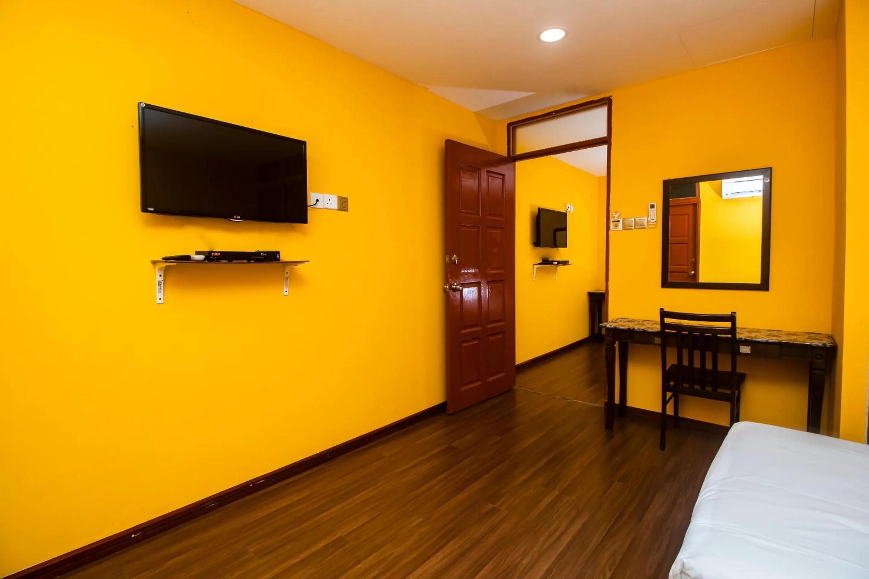 Bedroom in Hotel O Ltk Home