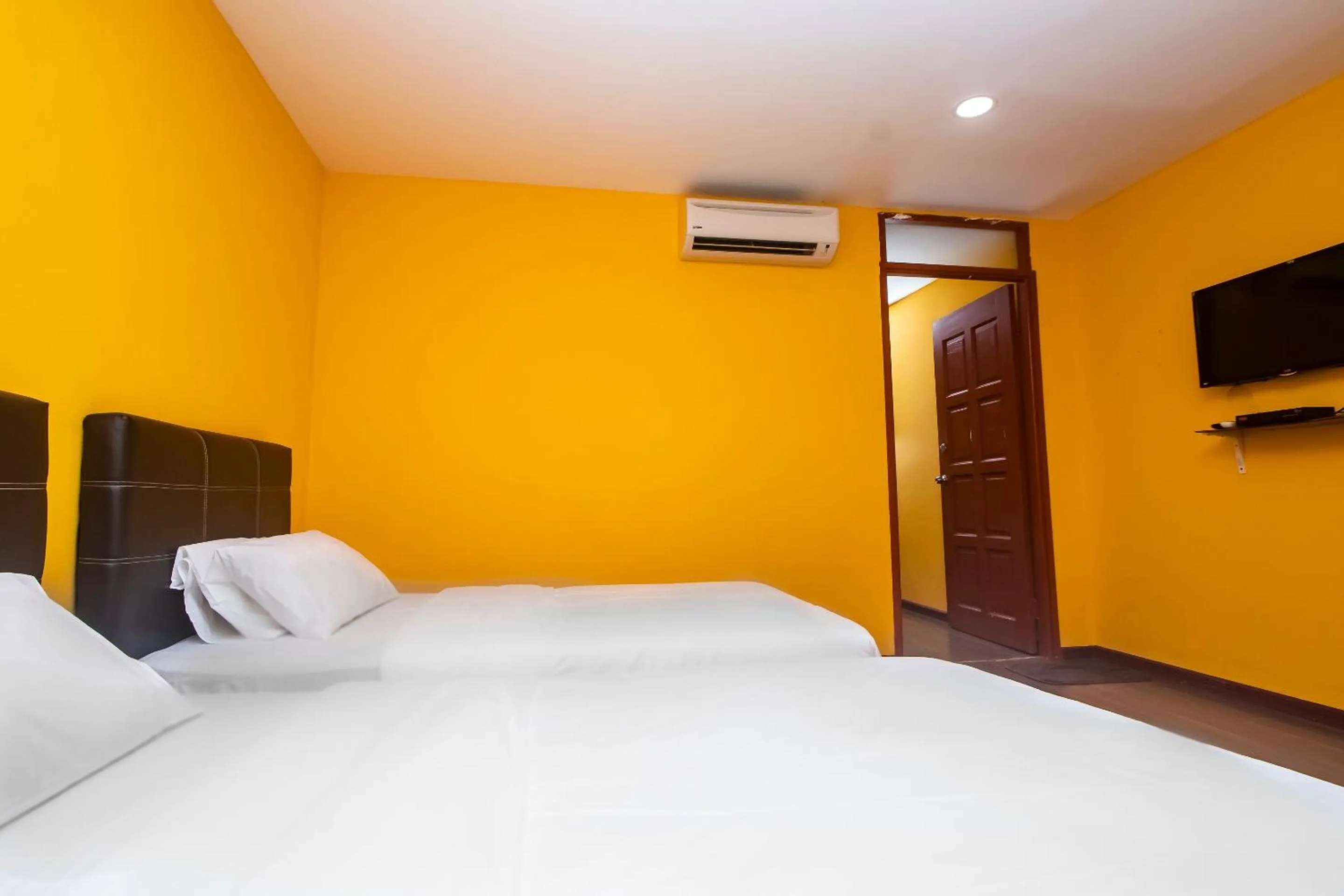 Bedroom in Hotel O Ltk Home