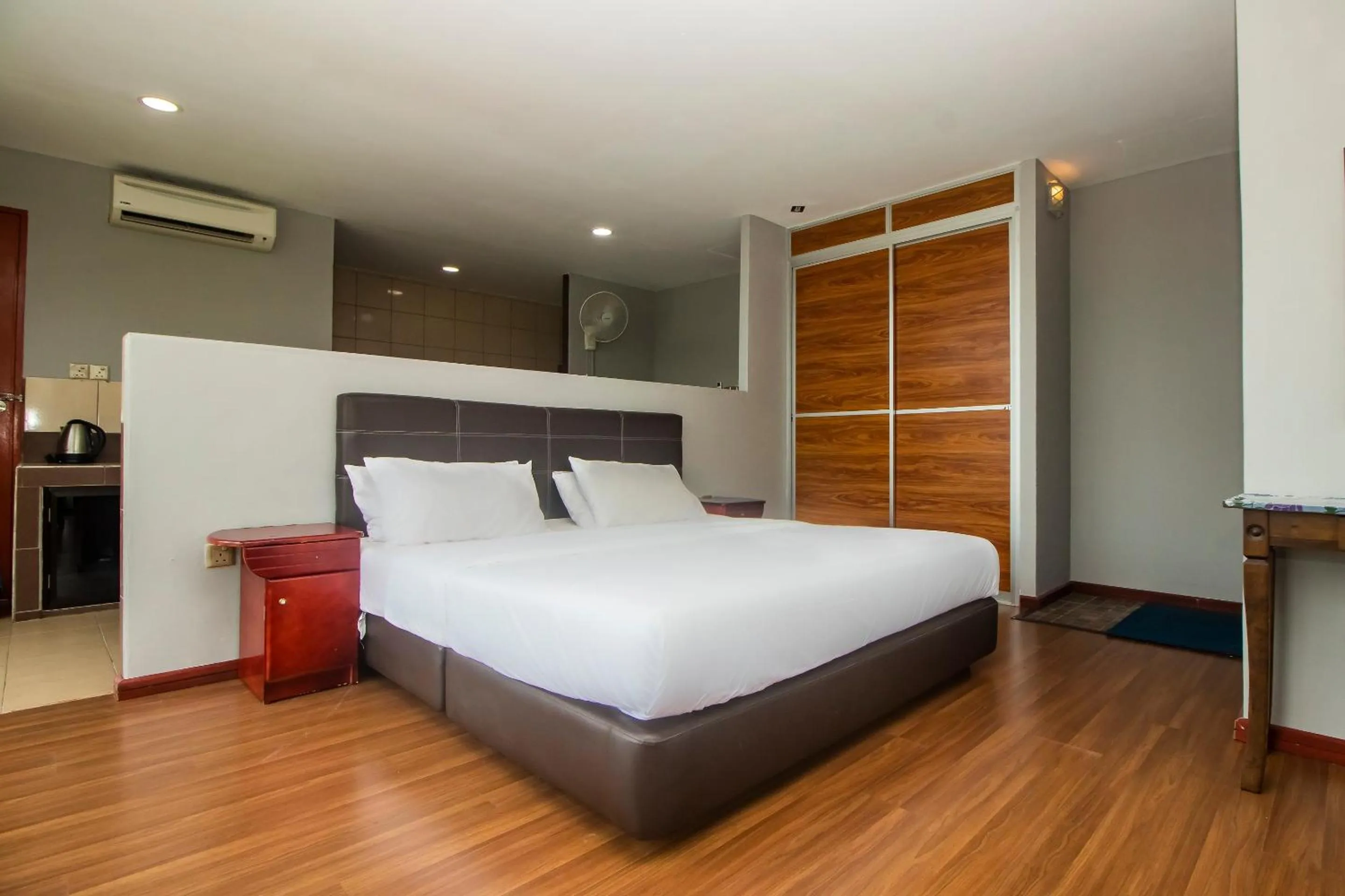 Bedroom in Hotel O Ltk Home