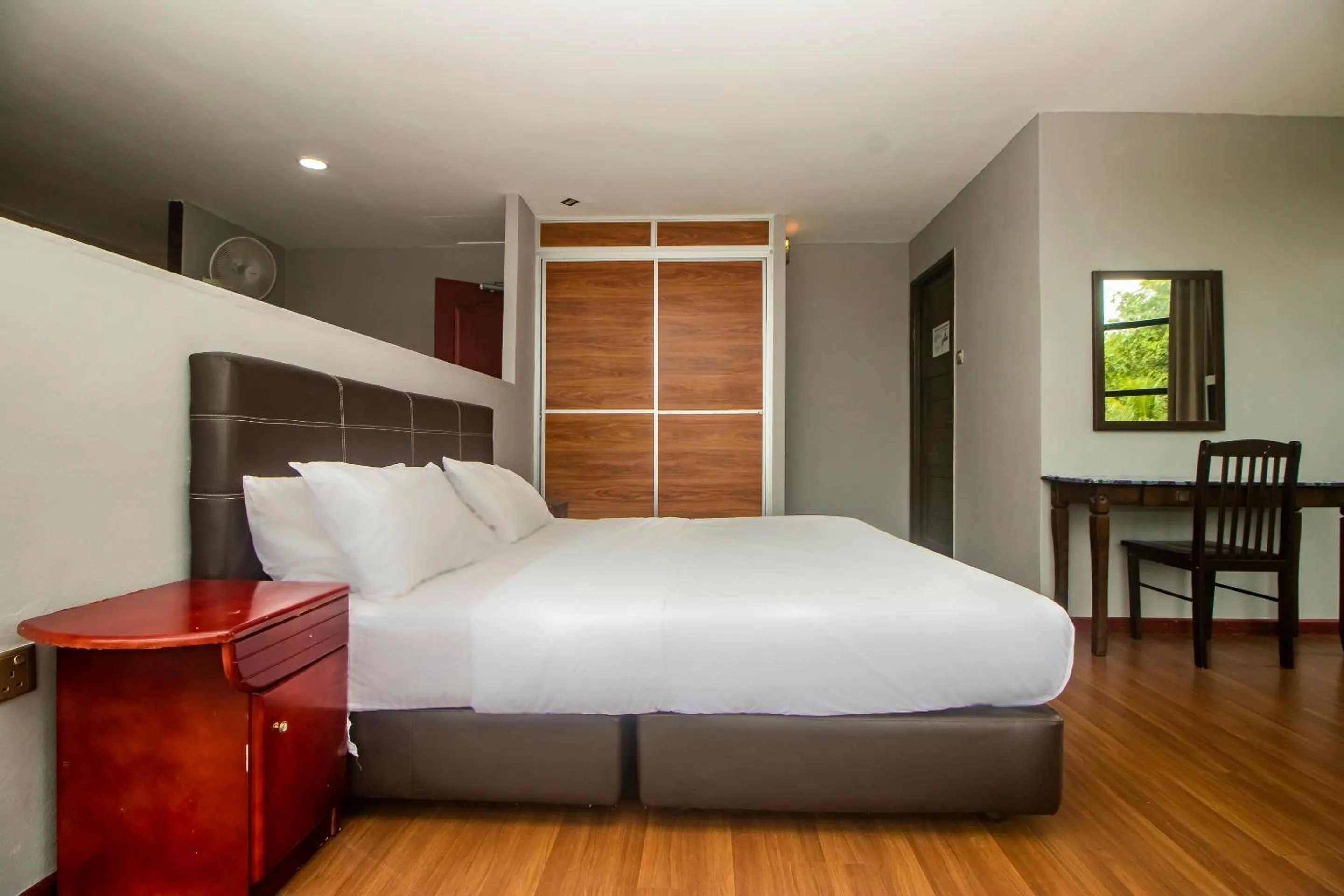 Bedroom in Hotel O Ltk Home