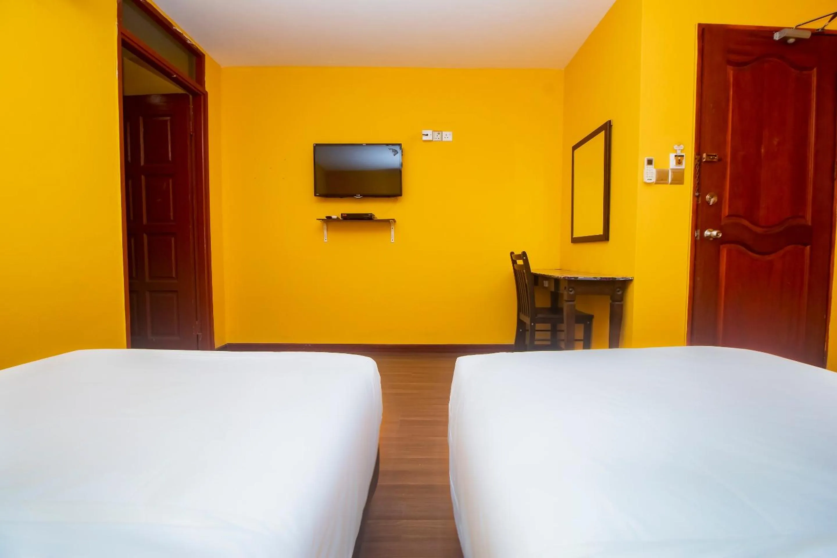 Bedroom in Hotel O Ltk Home