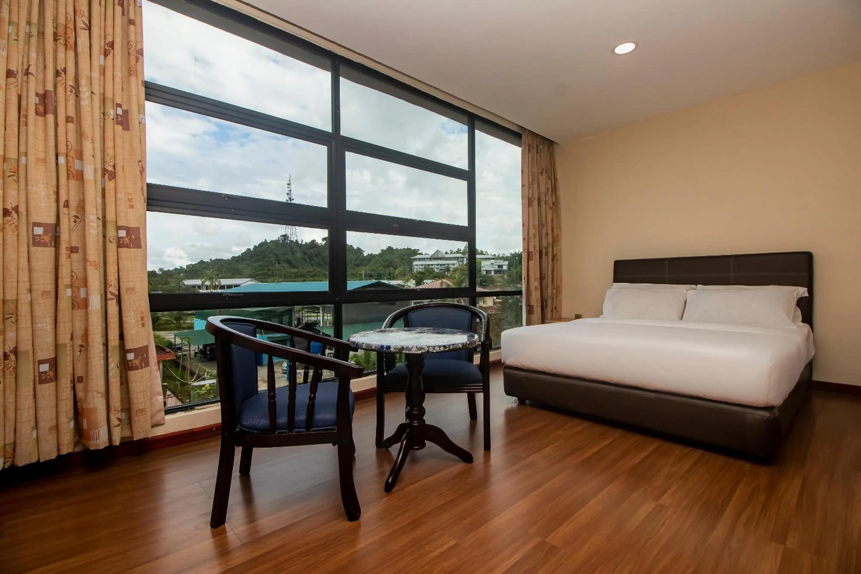 Bedroom in Hotel O Ltk Home