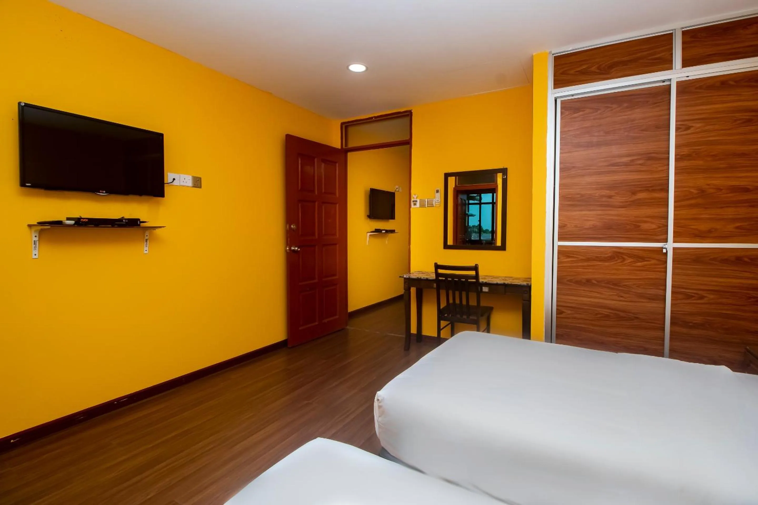 Bedroom in Hotel O Ltk Home