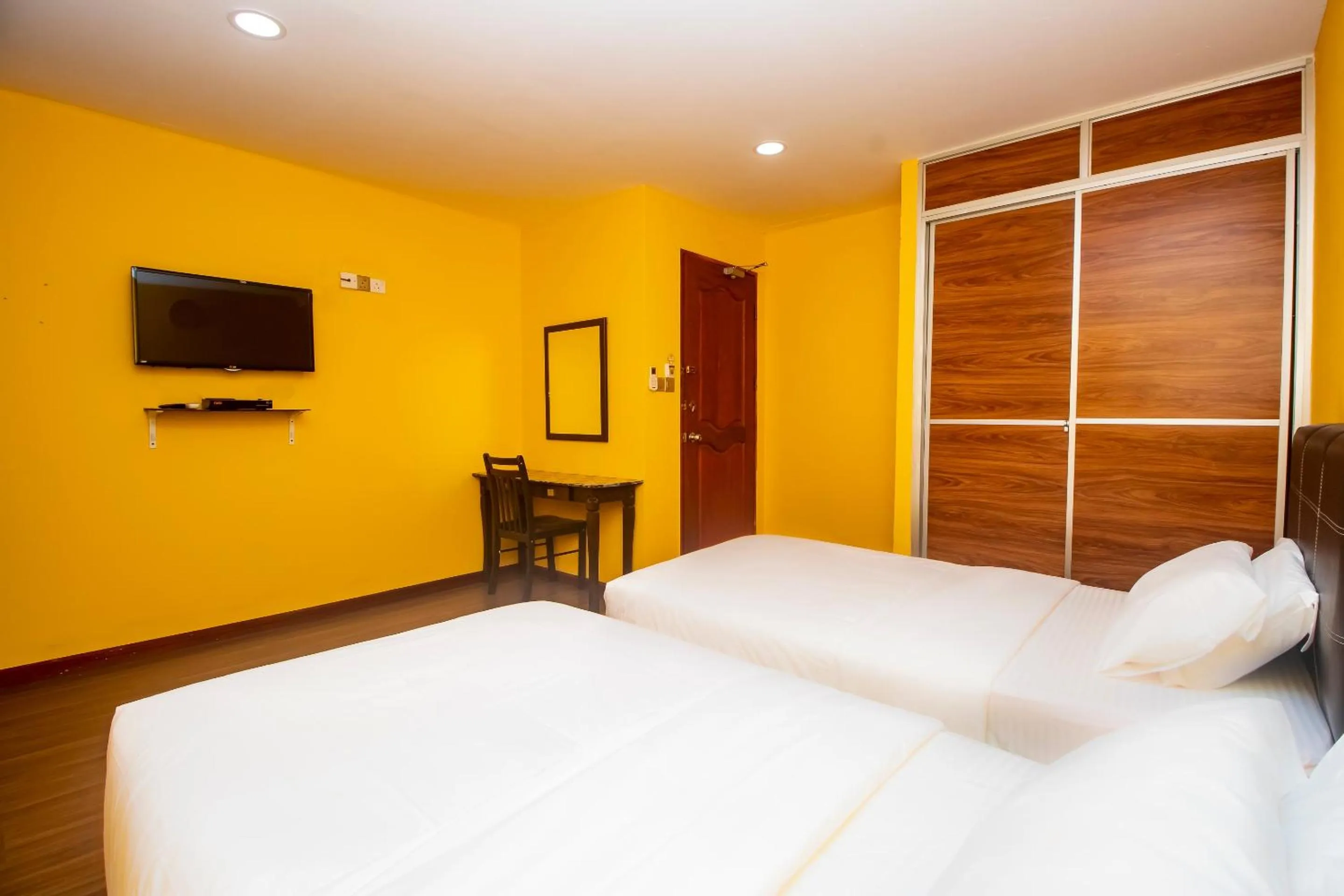 Bedroom in Hotel O Ltk Home