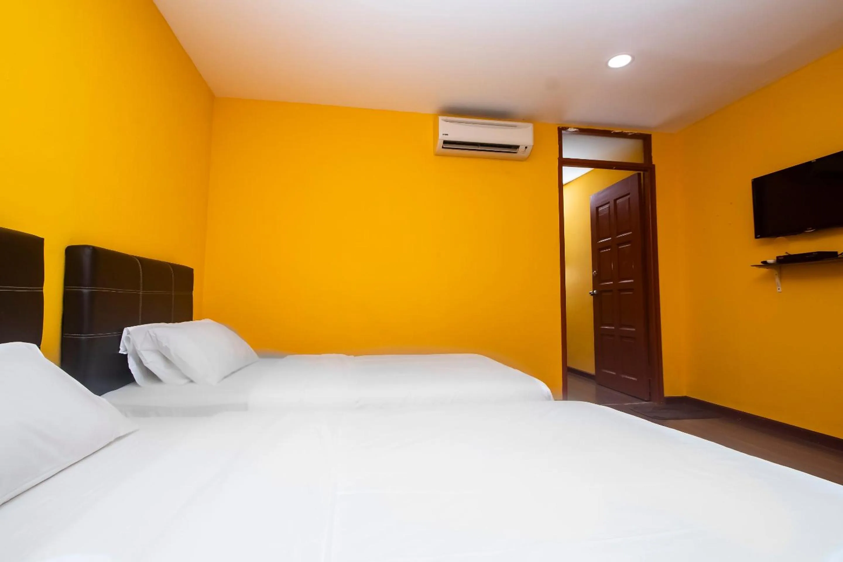 Bedroom in Hotel O Ltk Home