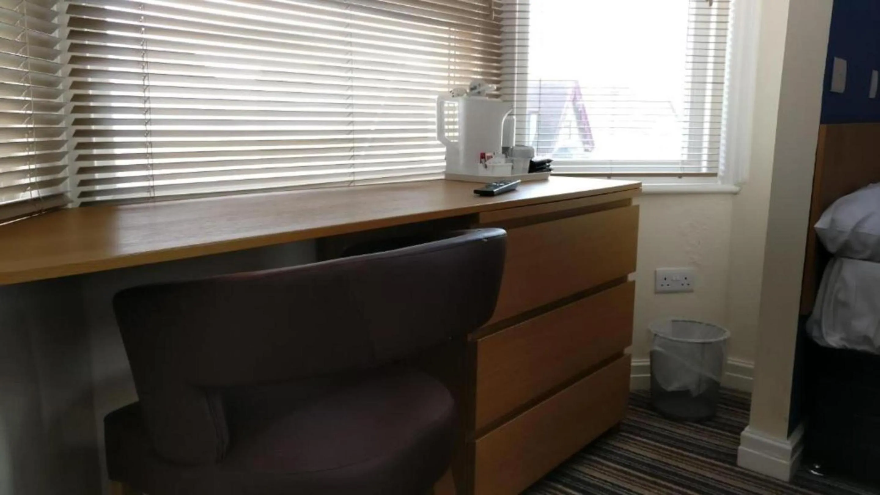 Bedroom in OYO Wave Crest Hotel