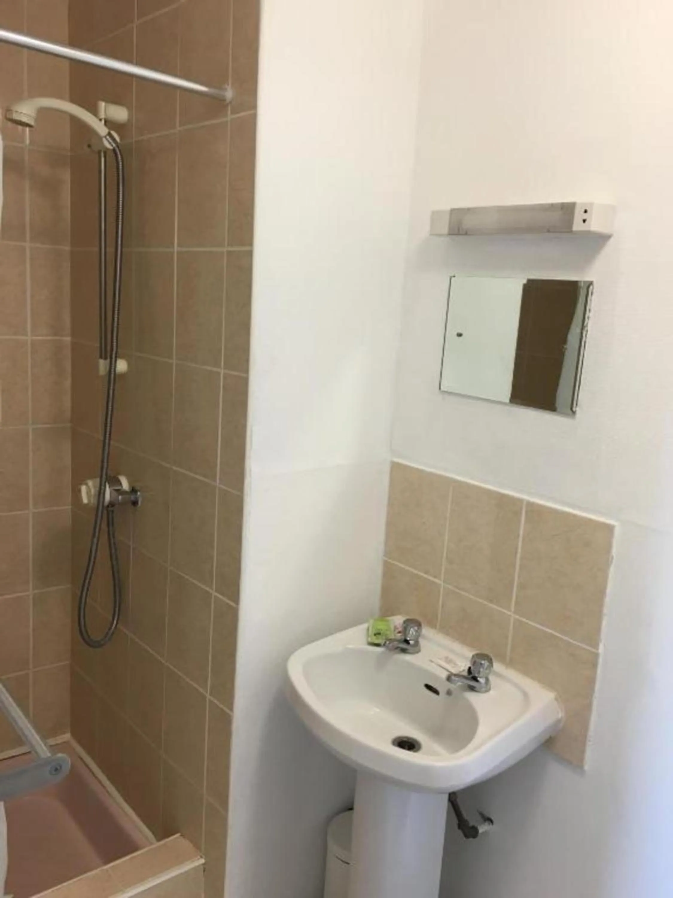 Bathroom in OYO Wave Crest Hotel