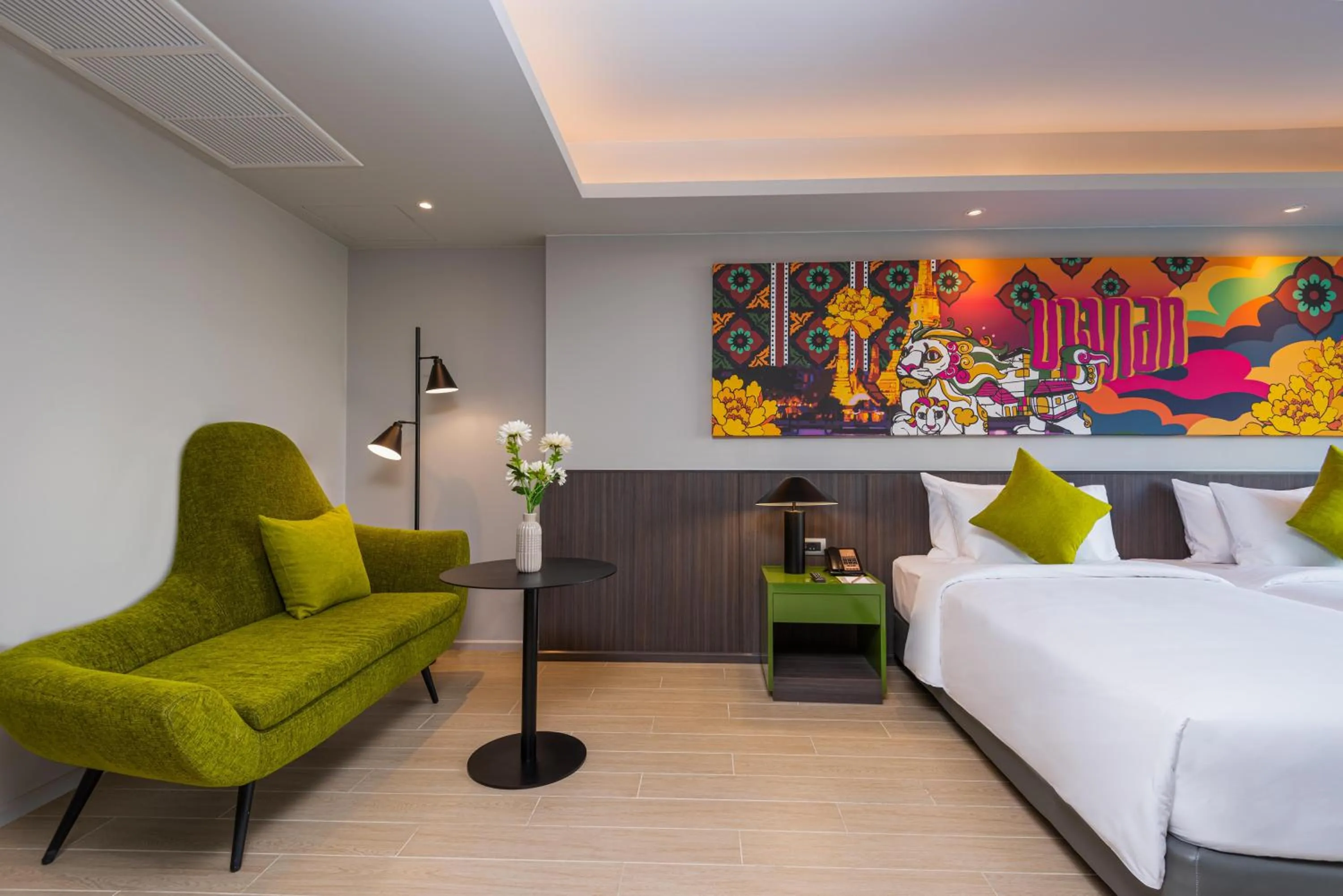 Seating area, Bed in Maitria Hotel Rama 9 Bangkok - A Chatrium Collection