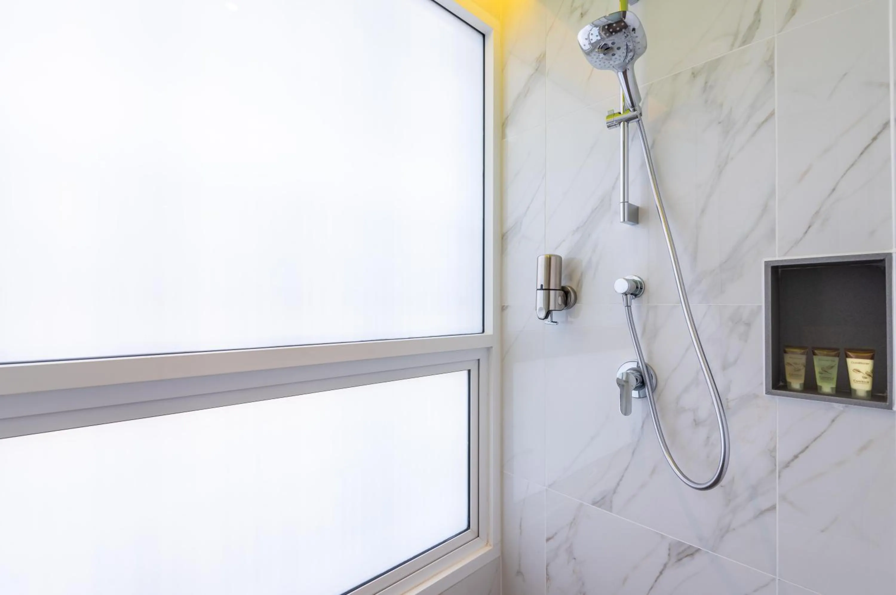 Shower in Maitria Hotel Rama 9 Bangkok - A Chatrium Collection