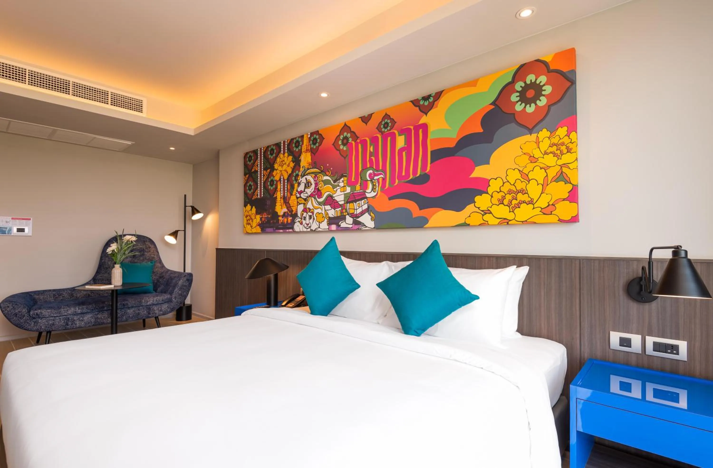 Bed in Maitria Hotel Rama 9 Bangkok - A Chatrium Collection