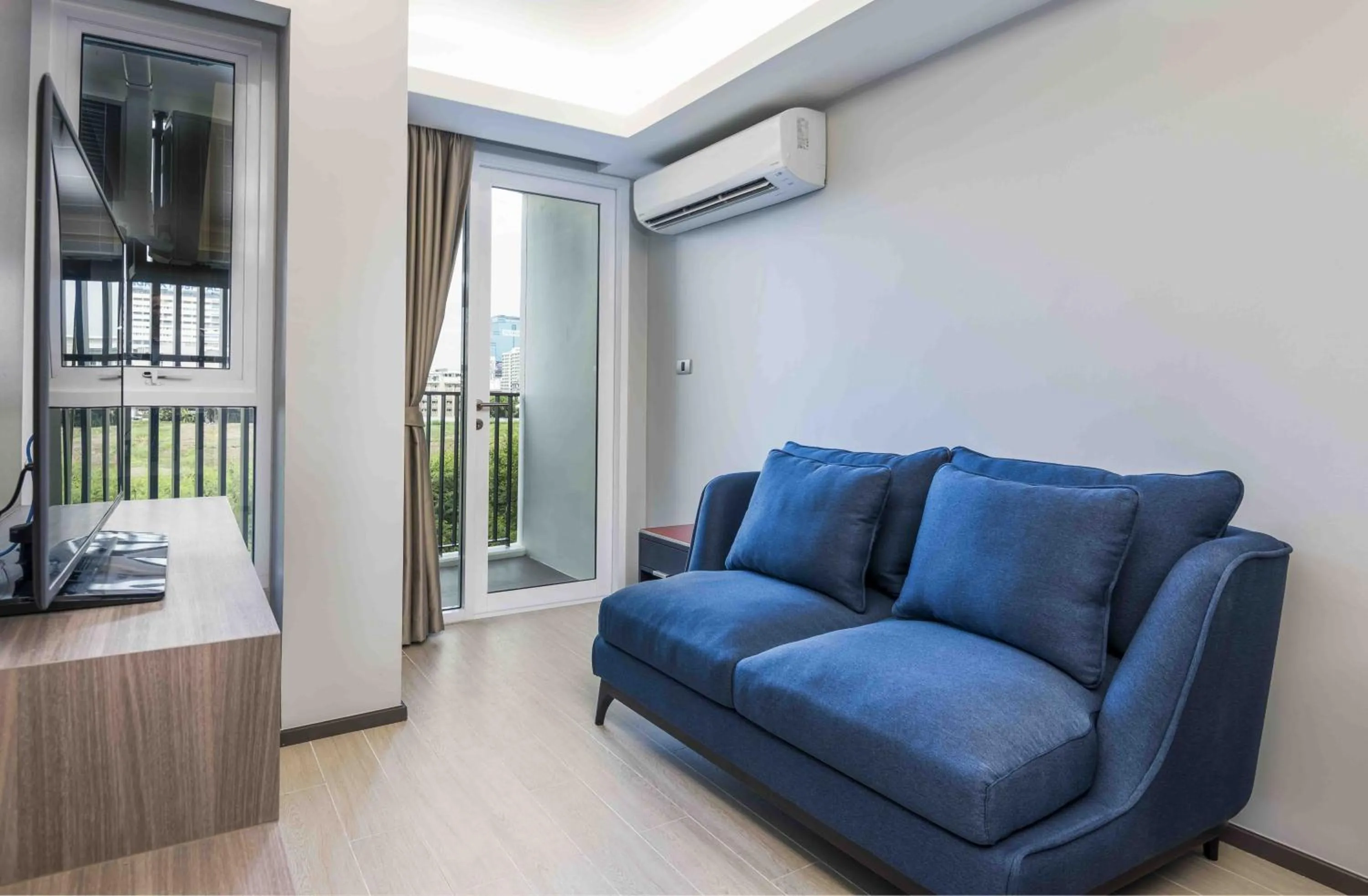 Living room in Maitria Hotel Rama 9 Bangkok - A Chatrium Collection