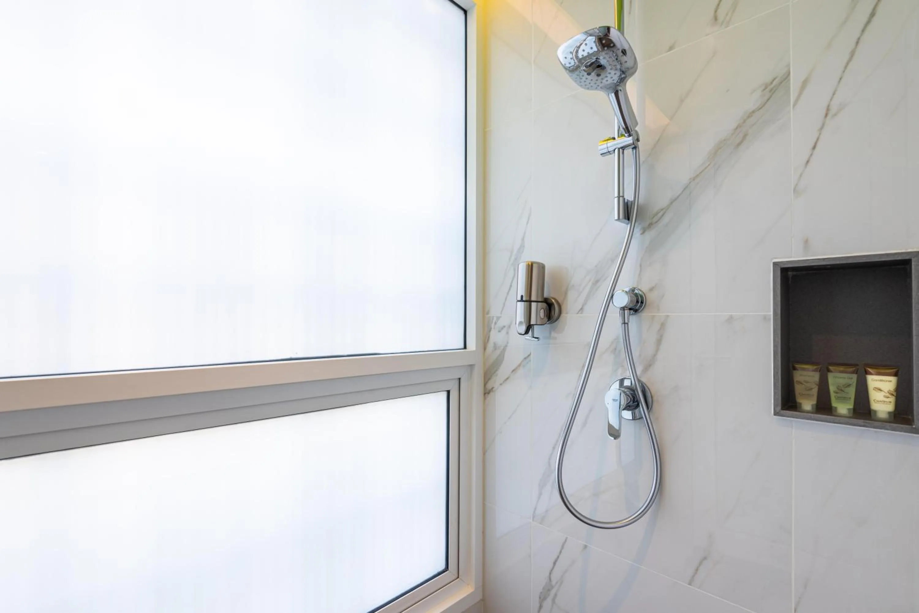 Shower in Maitria Hotel Rama 9 Bangkok - A Chatrium Collection