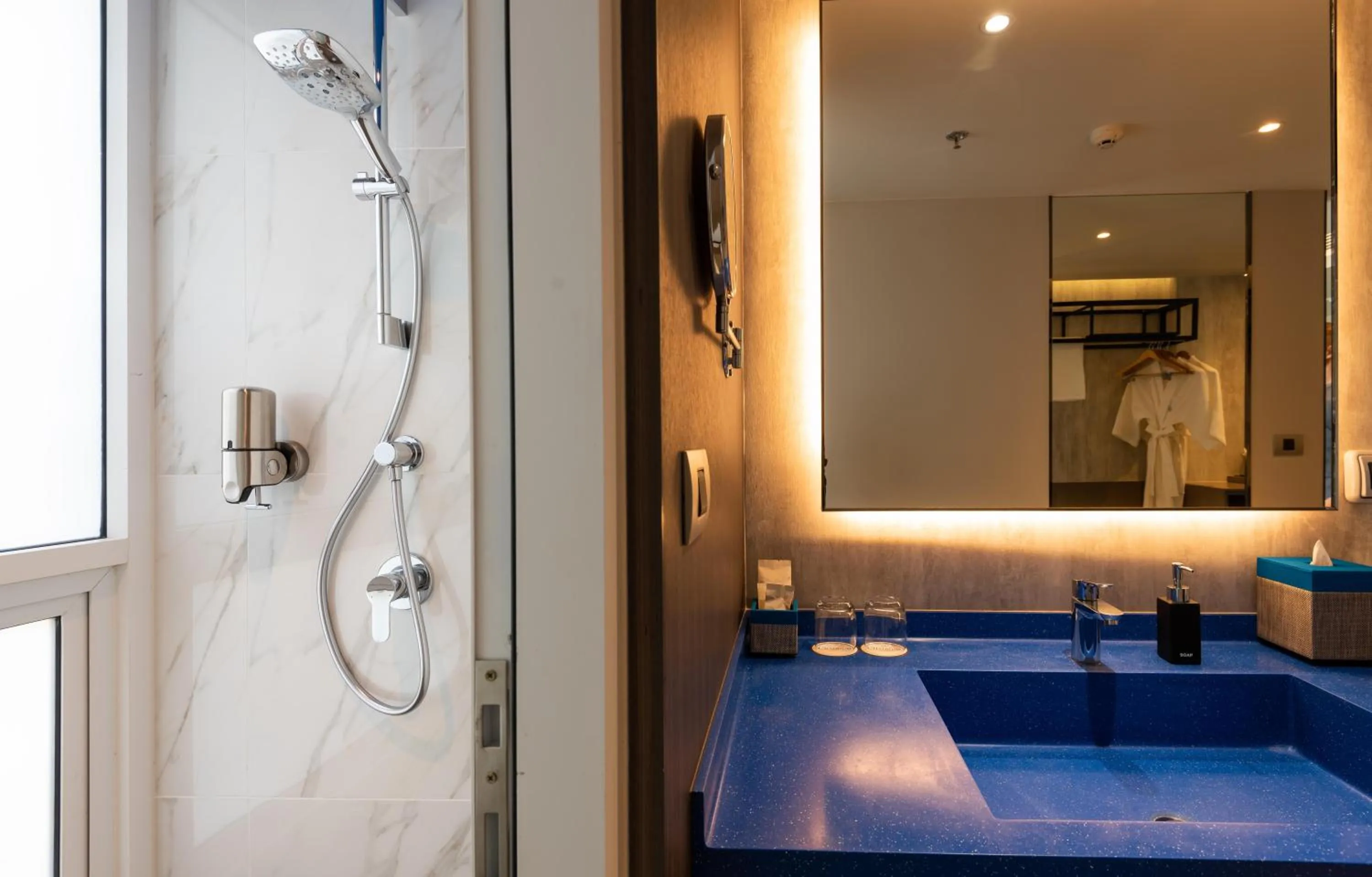 Shower in Maitria Hotel Rama 9 Bangkok - A Chatrium Collection