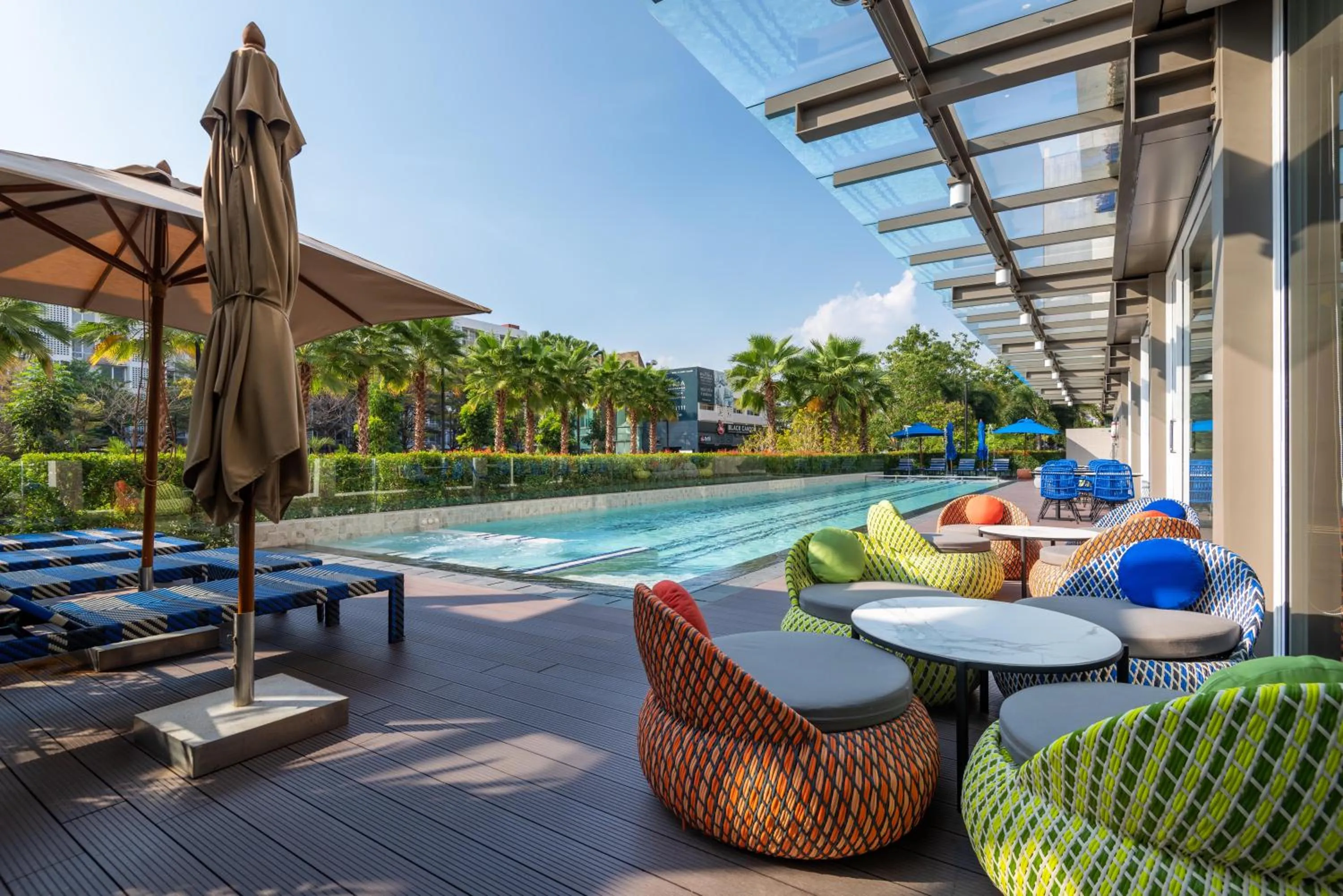 Swimming pool in Maitria Hotel Rama 9 Bangkok - A Chatrium Collection