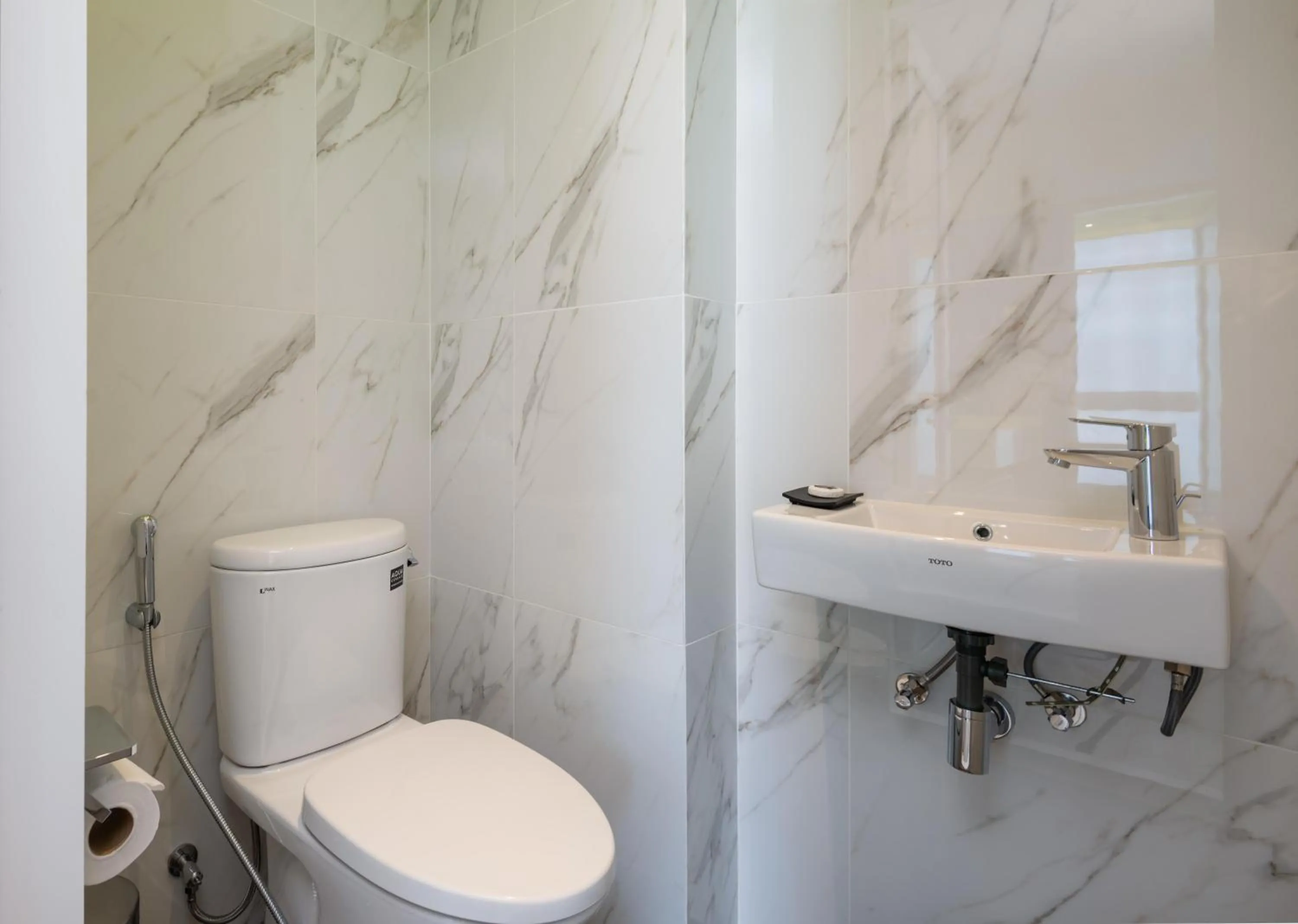 Toilet in Maitria Hotel Rama 9 Bangkok - A Chatrium Collection