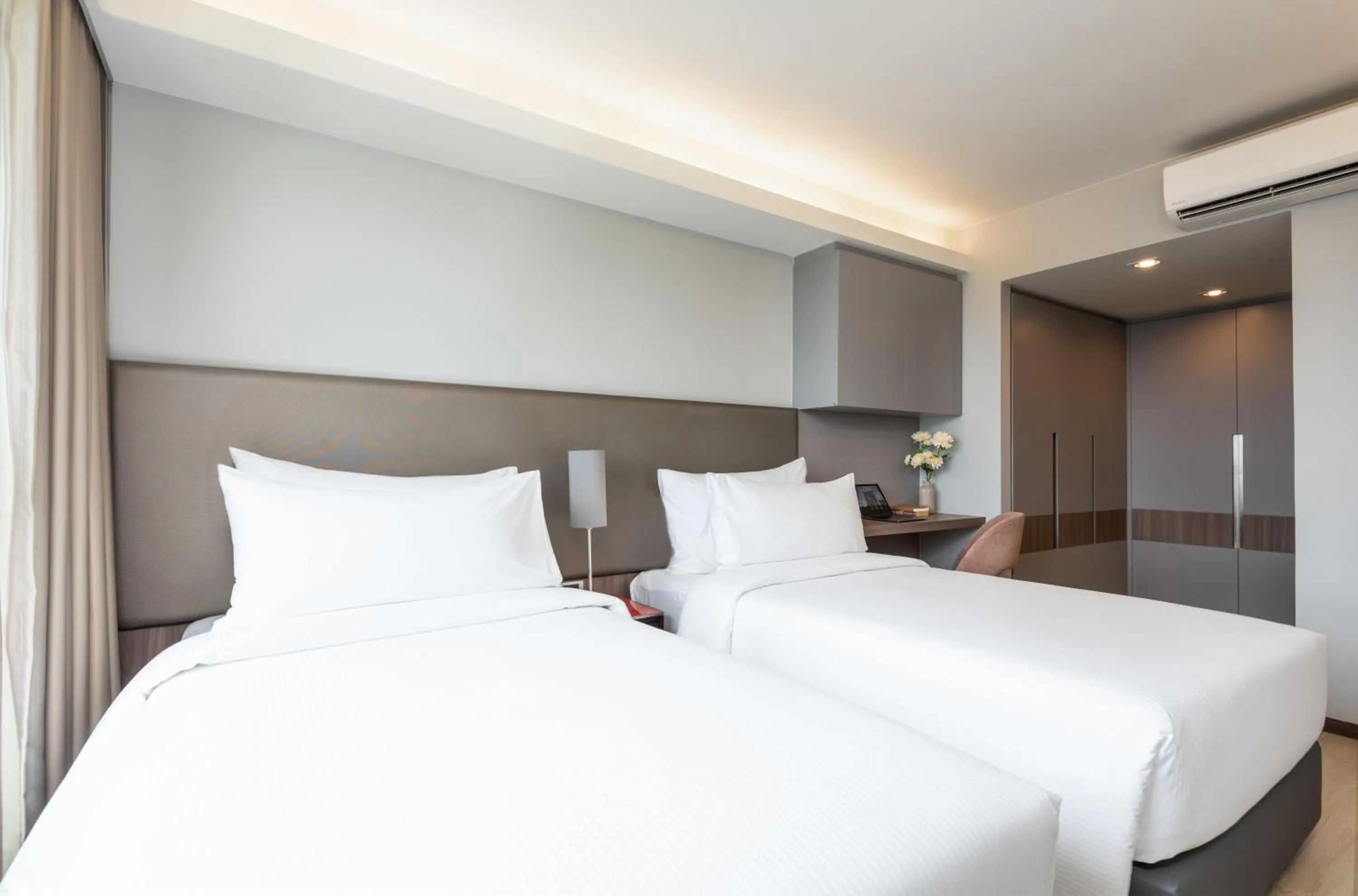 Bed in Maitria Hotel Rama 9 Bangkok - A Chatrium Collection