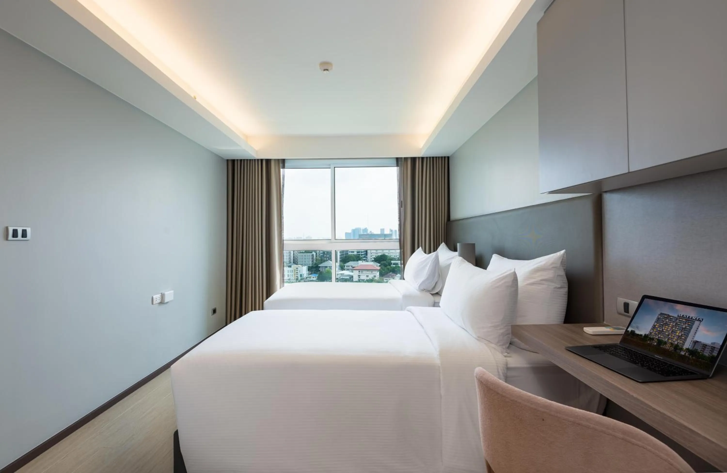 Bed in Maitria Hotel Rama 9 Bangkok - A Chatrium Collection