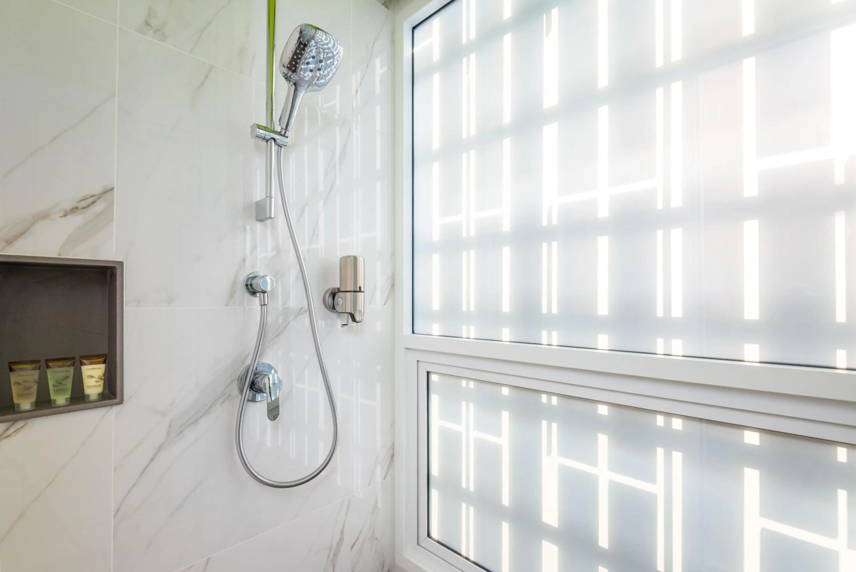 Shower in Maitria Hotel Rama 9 Bangkok - A Chatrium Collection