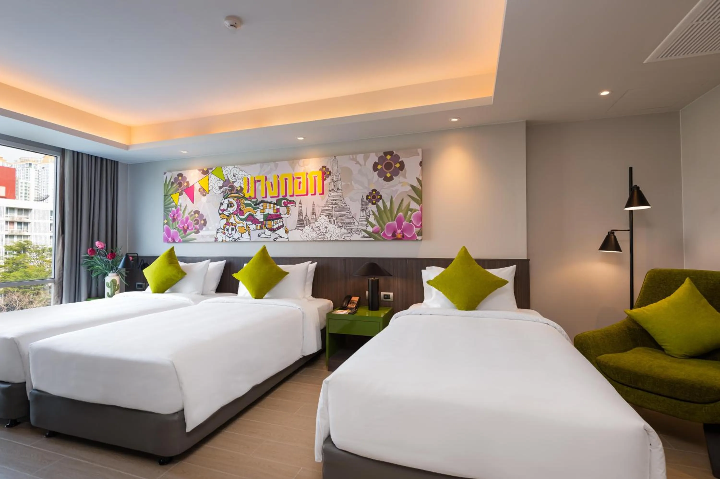 Bed in Maitria Hotel Rama 9 Bangkok - A Chatrium Collection