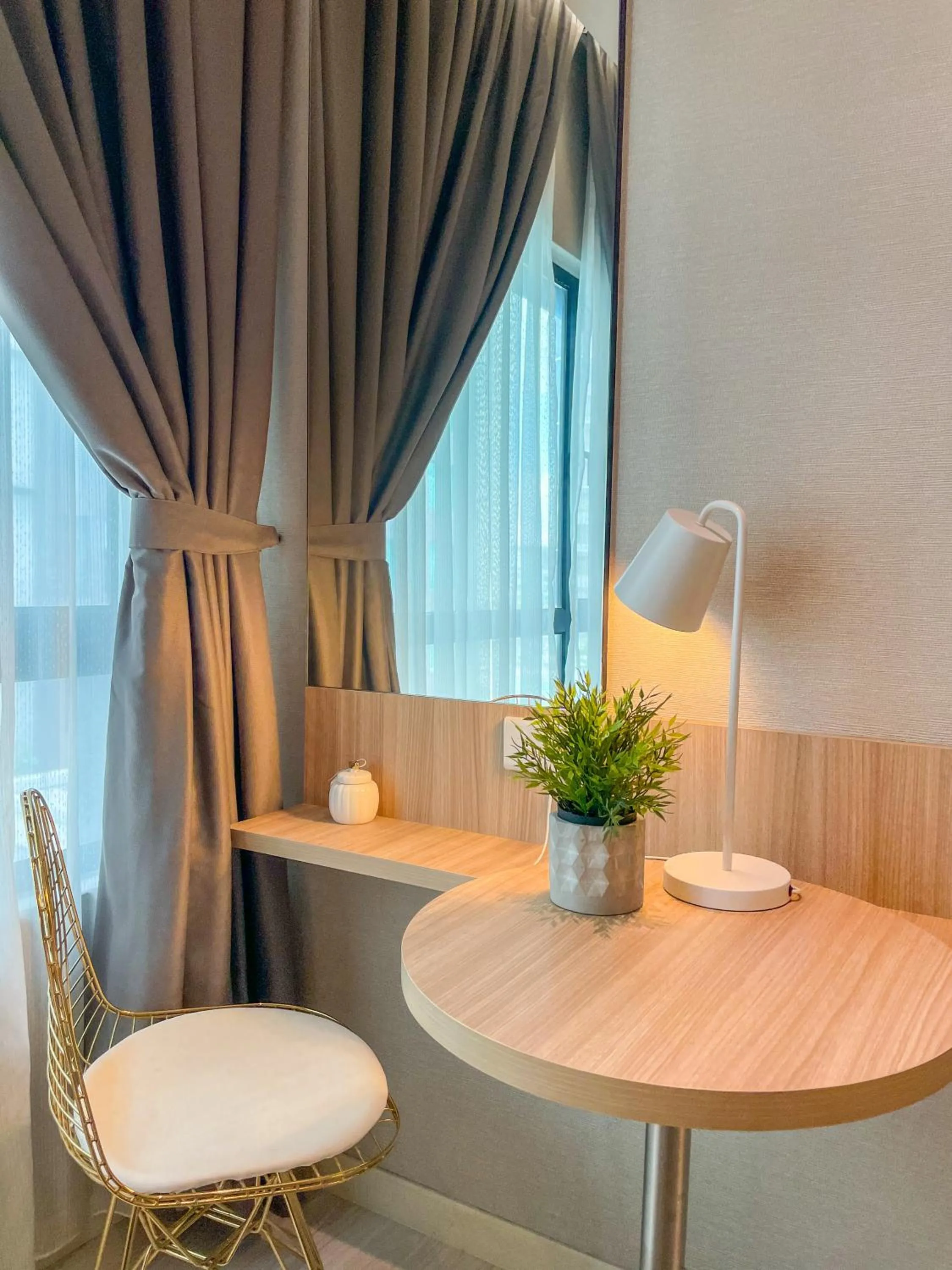 Seating area in Suasana Residence by Nest Home