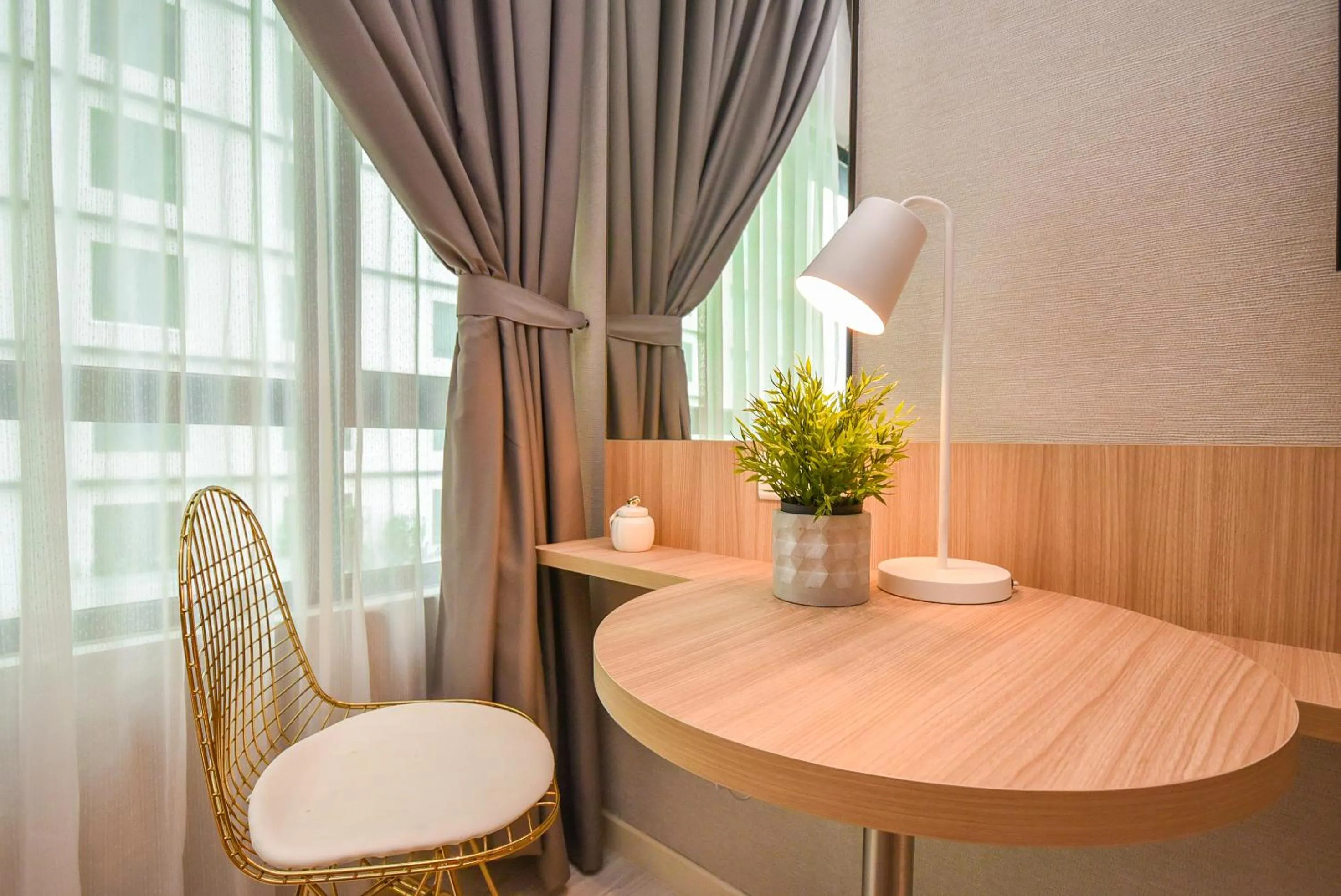 Seating area in Suasana Residence by Nest Home