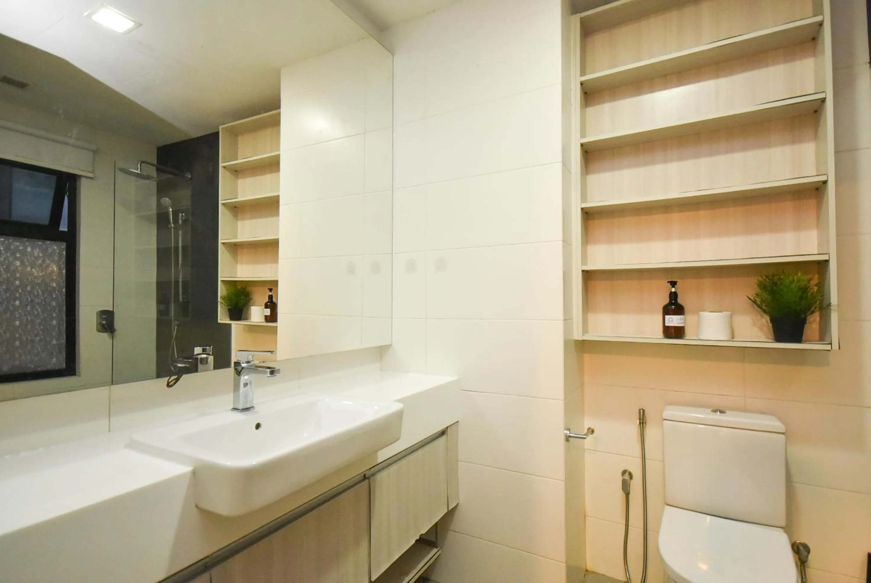 Bathroom in Suasana Residence by Nest Home