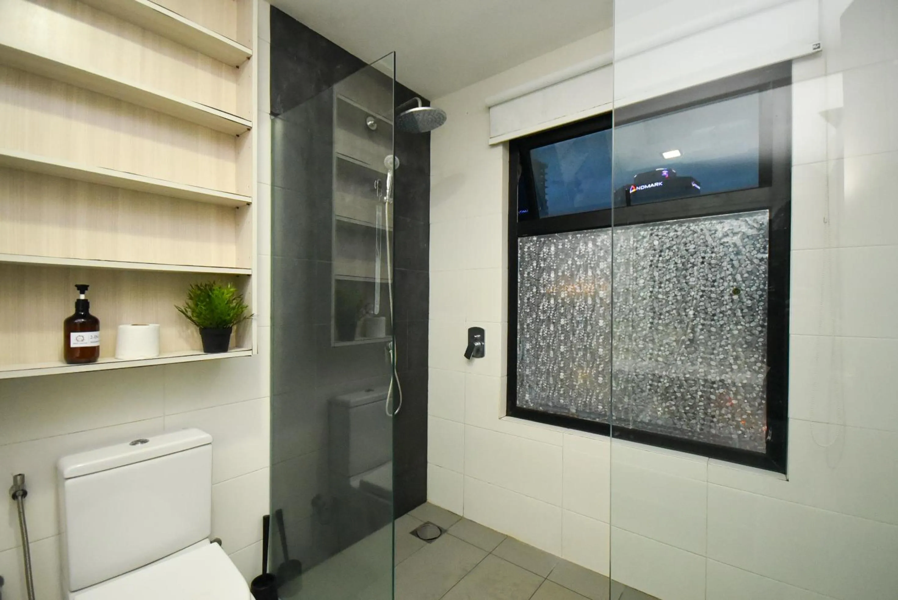 Bathroom in Suasana Residence by Nest Home