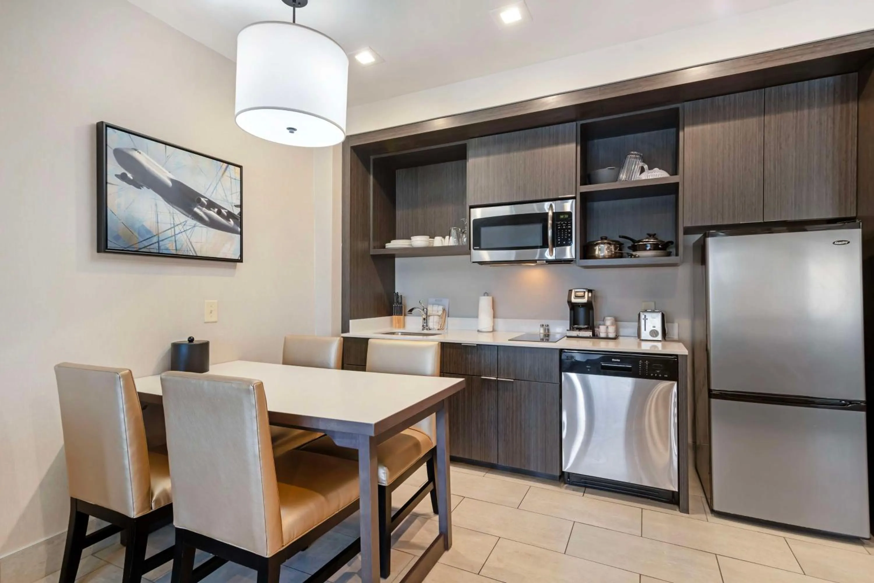 Bedroom in Best Western Plus Executive Residency Rigby's Water World Hotel