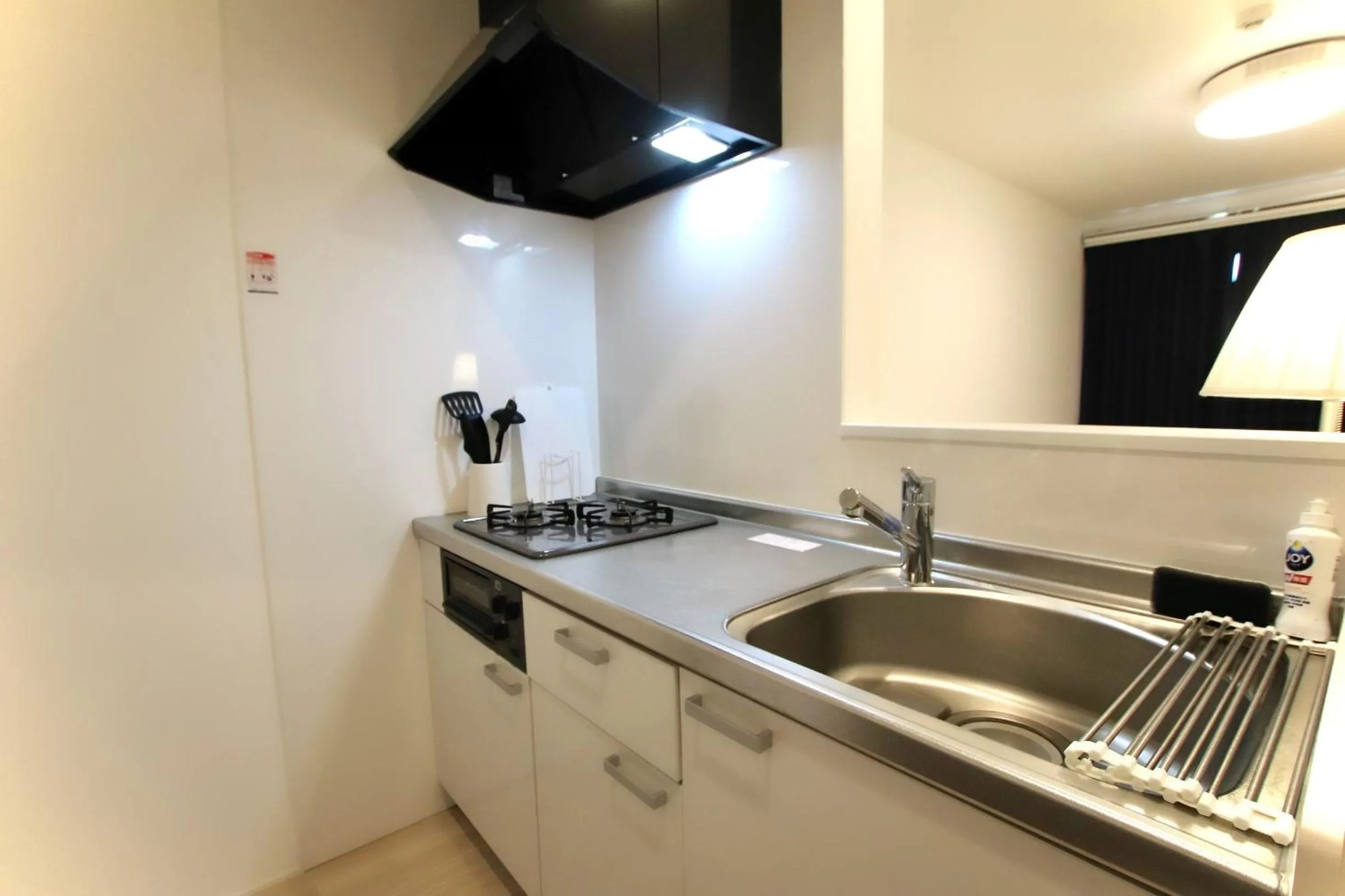 Kitchen or kitchenette in Hotel Southern Suite Kugai