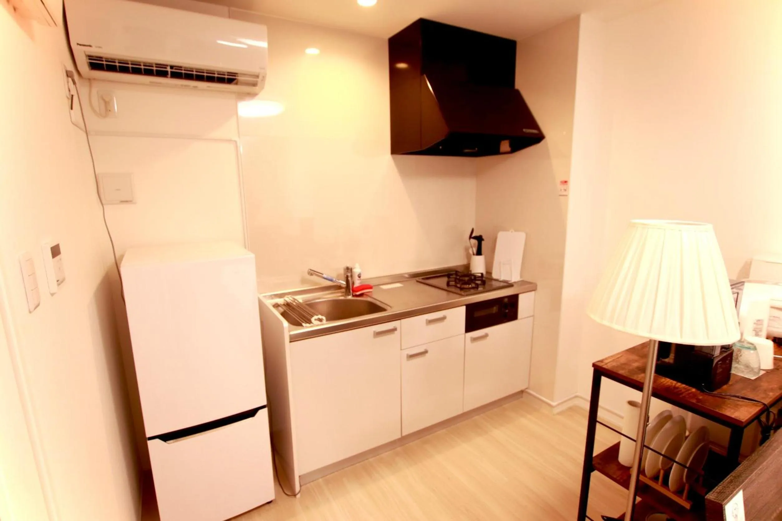 Kitchen or kitchenette in Hotel Southern Suite Kugai