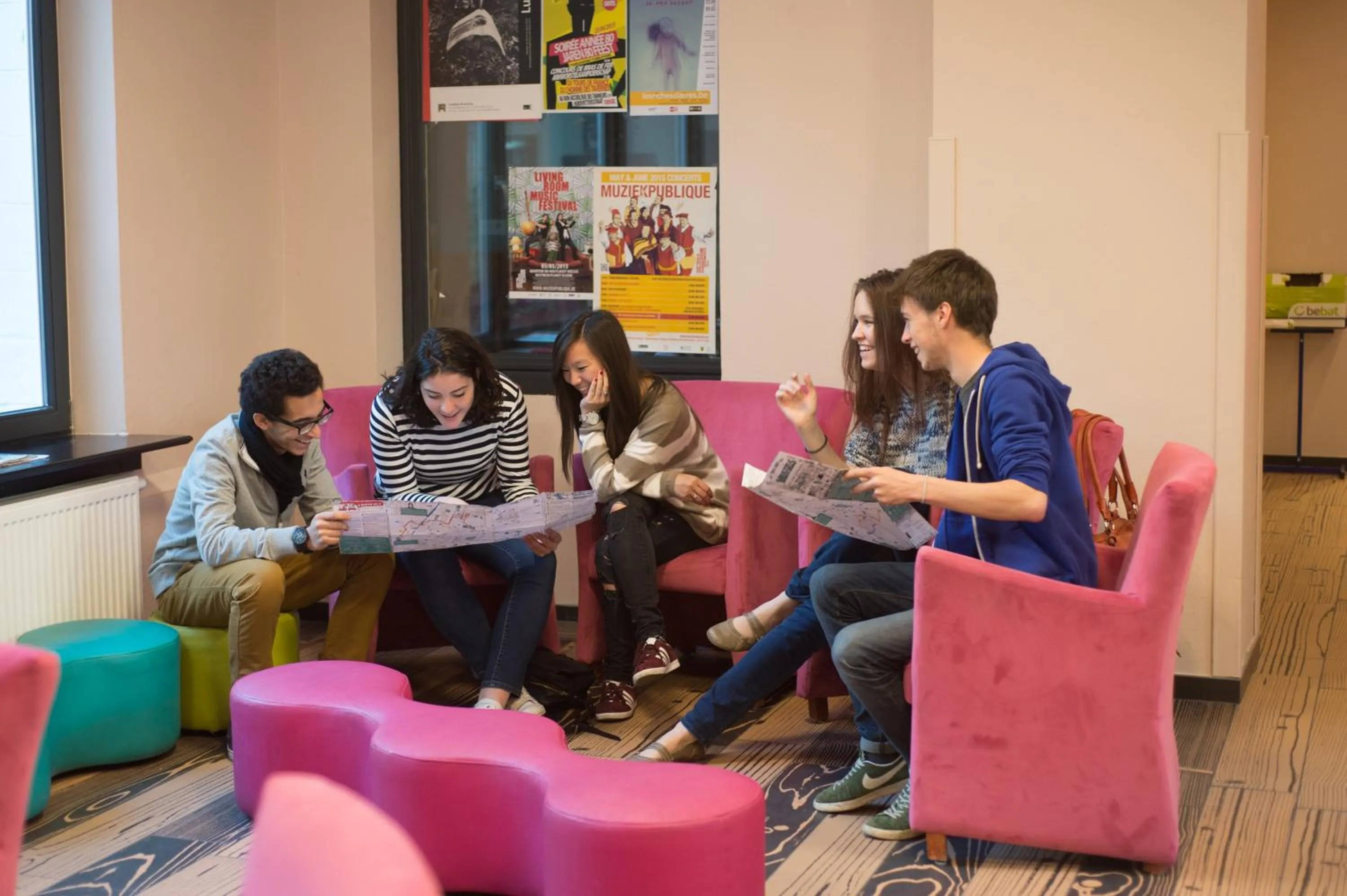 Communal lounge/ TV room in HI Brussels Jacques Brel Hostel
