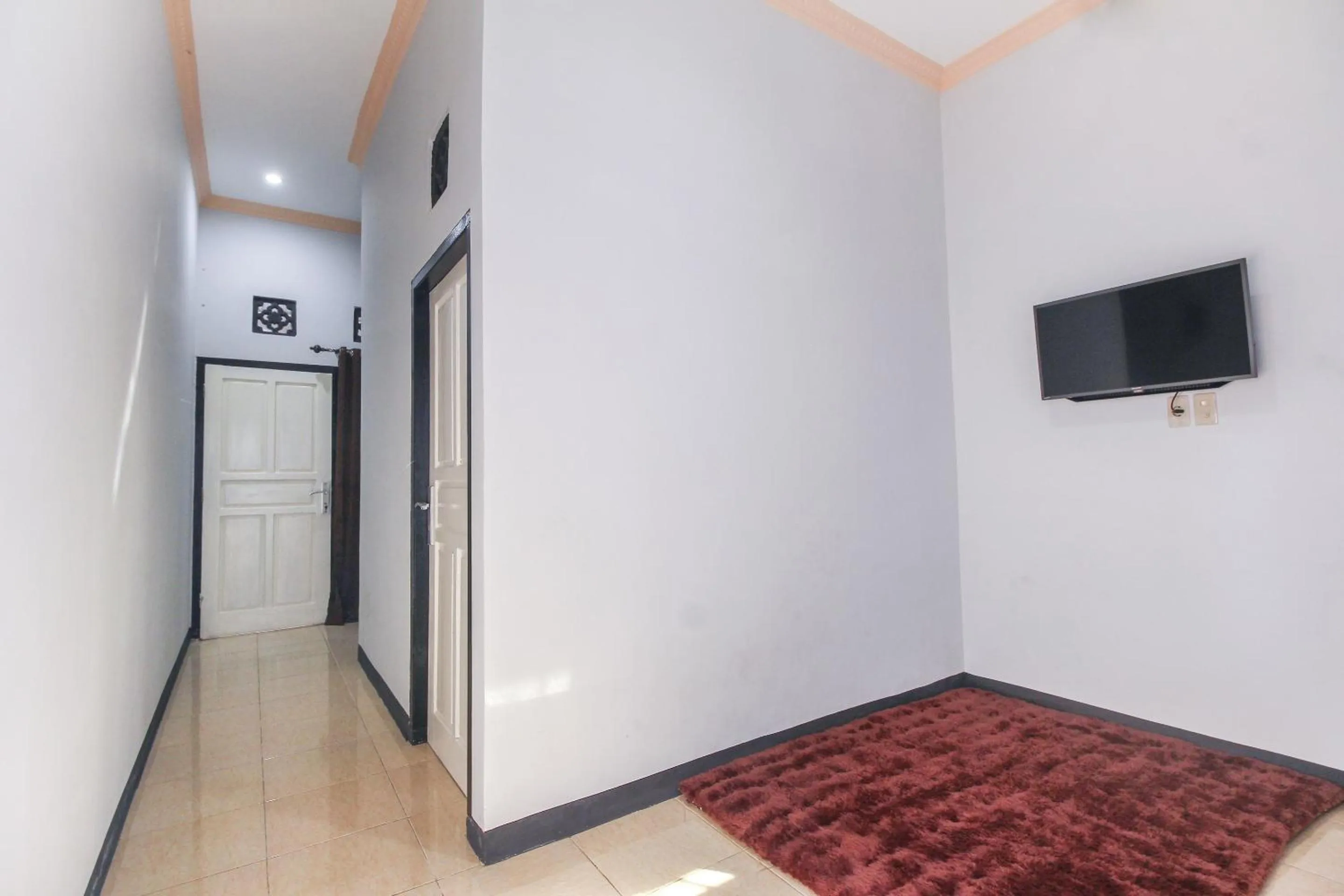 Bedroom in OYO 3399 Gea Guest House