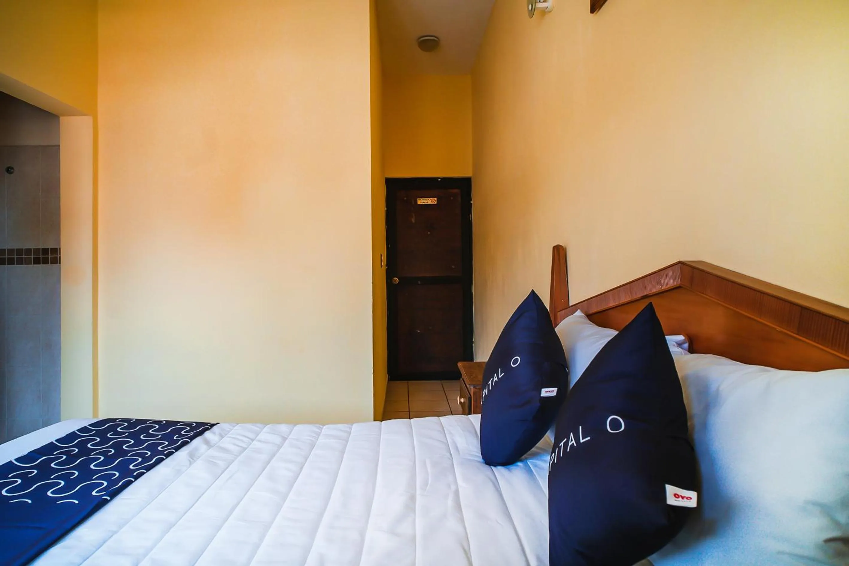 Bed in Capital O Hotel Aurora, Tuxtla Gutiérrez