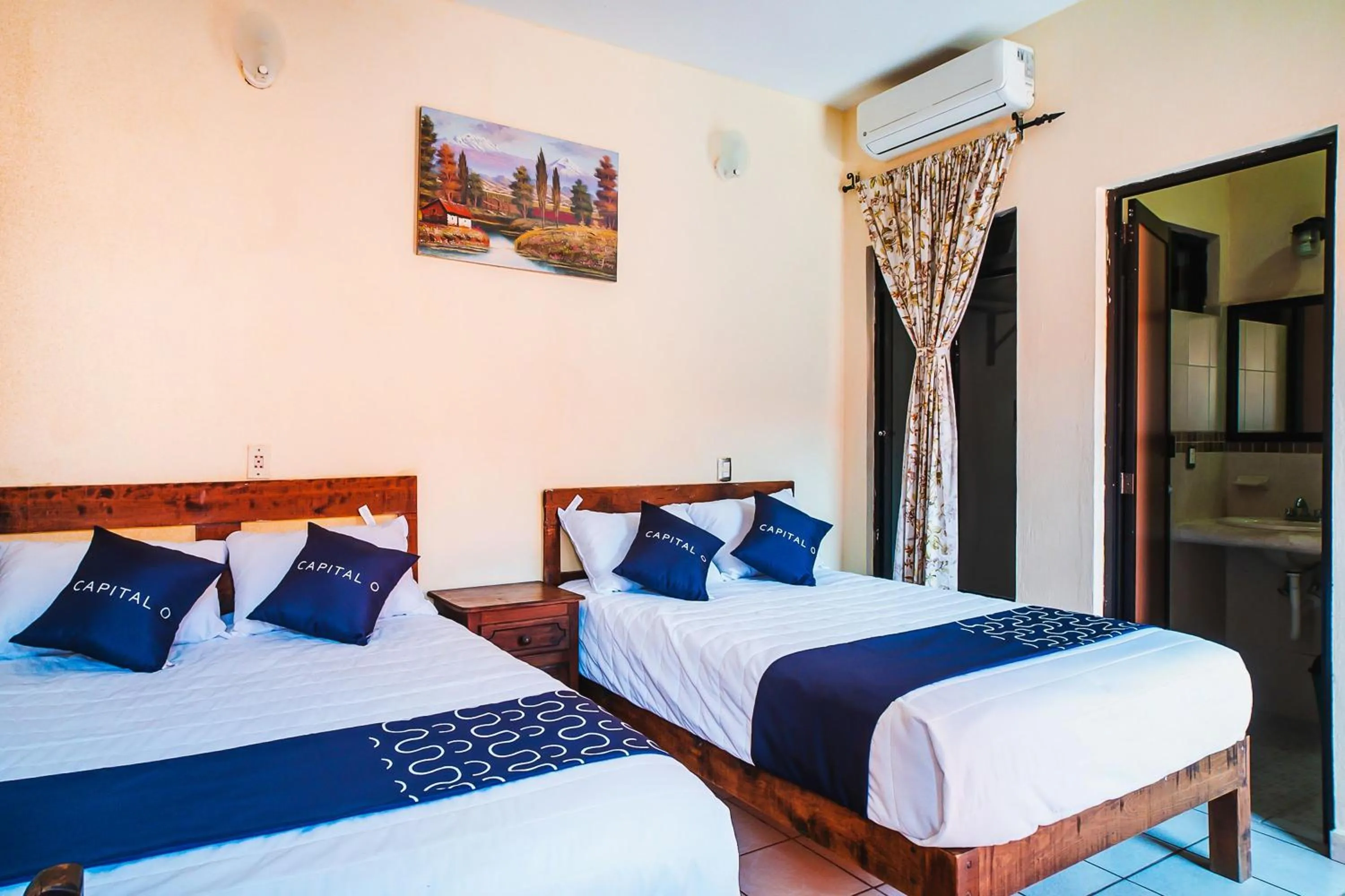 Bed in Capital O Hotel Aurora, Tuxtla Gutiérrez