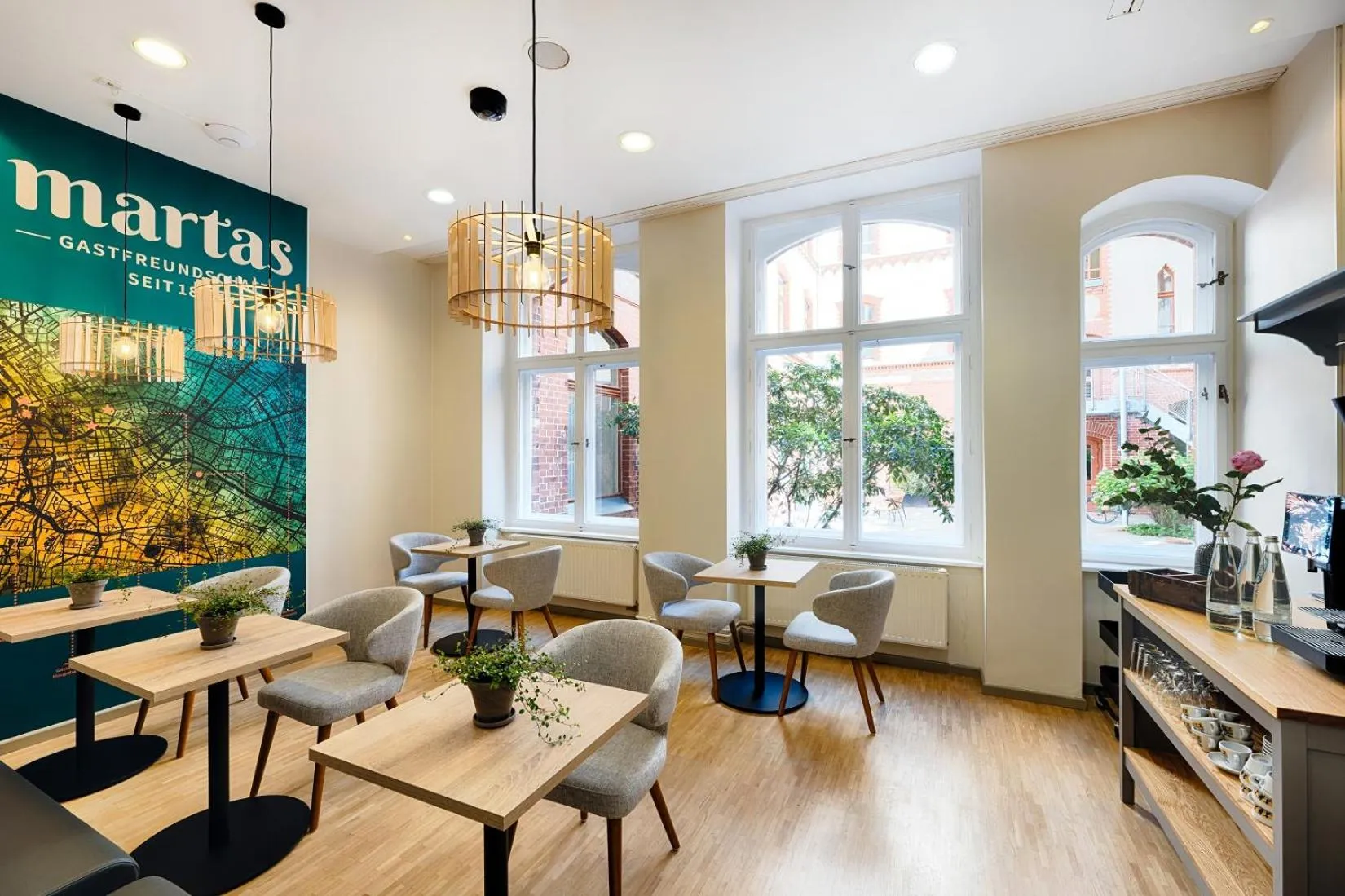 Communal lounge/ TV room in martas Hotel Berlin-Mitte