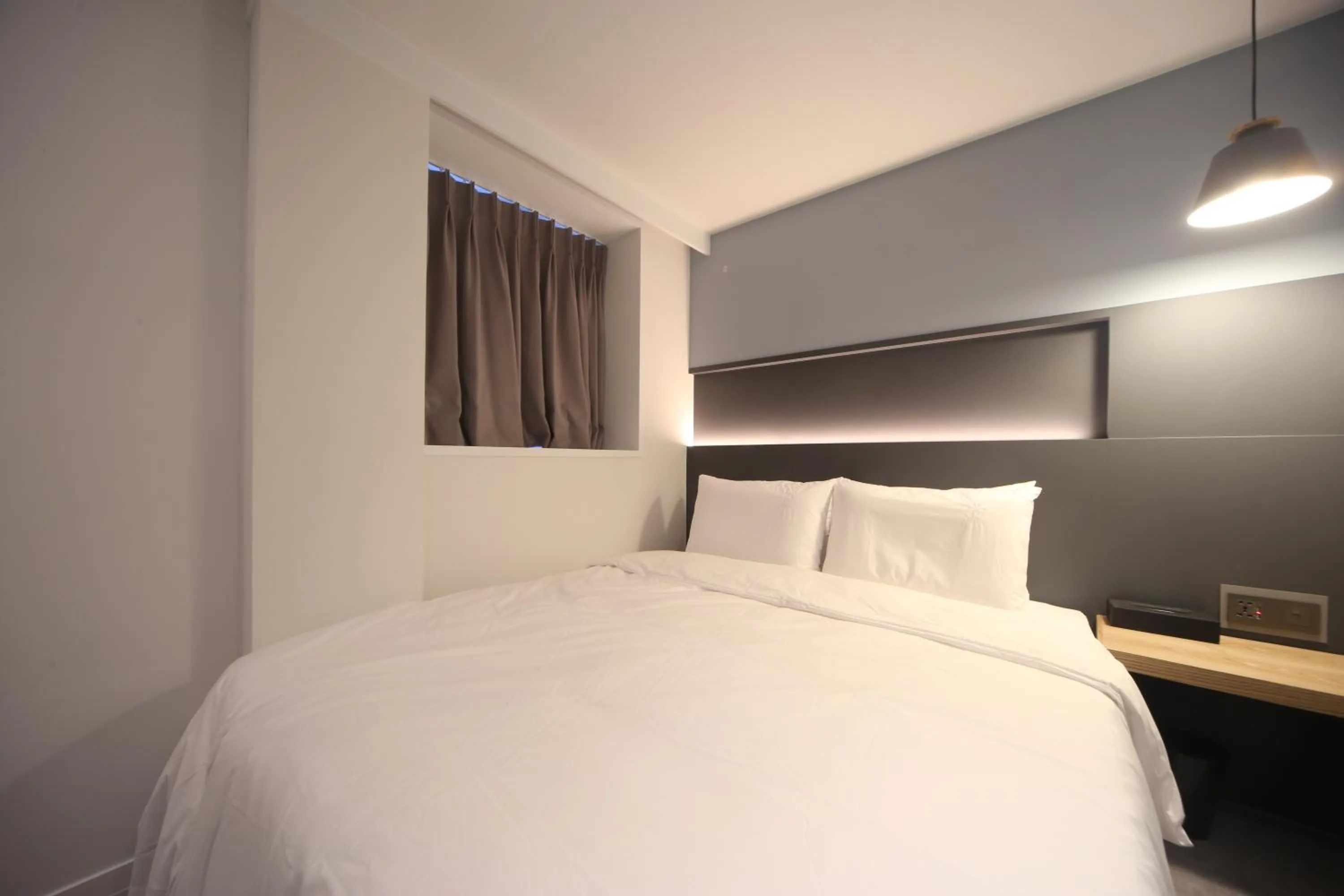 Bed in Hotel Thegrang Daeyeon