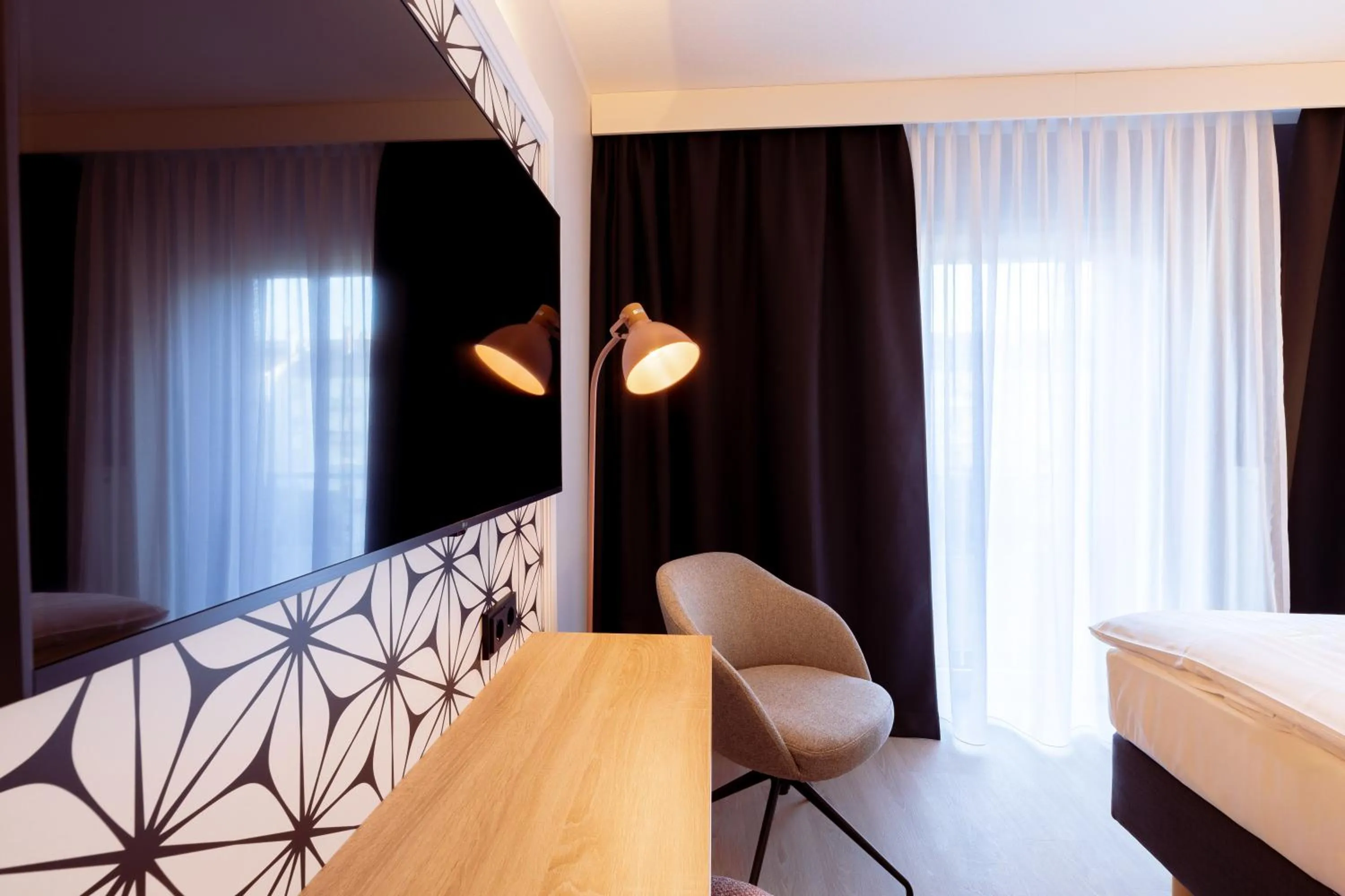 Photo of the whole room, Bed in Garner Hotel Mannheim City by IHG