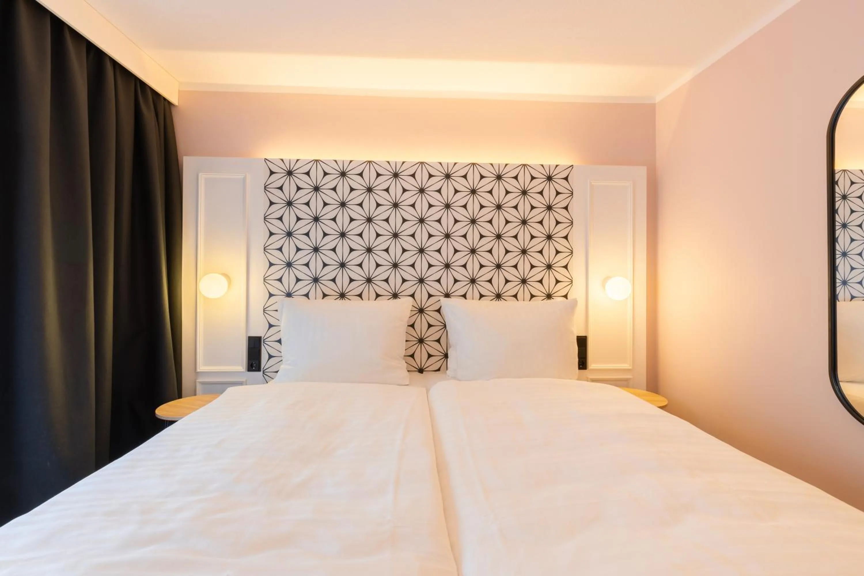 Photo of the whole room, Bed in Garner Hotel Mannheim City by IHG