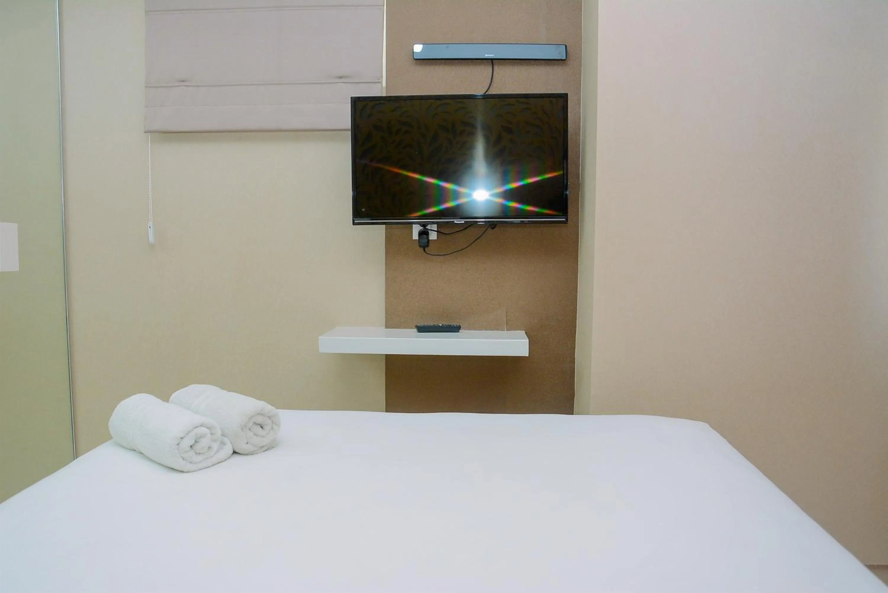 Bed in Comfy and Luxury 3BR Springlake Apartment By Travelio