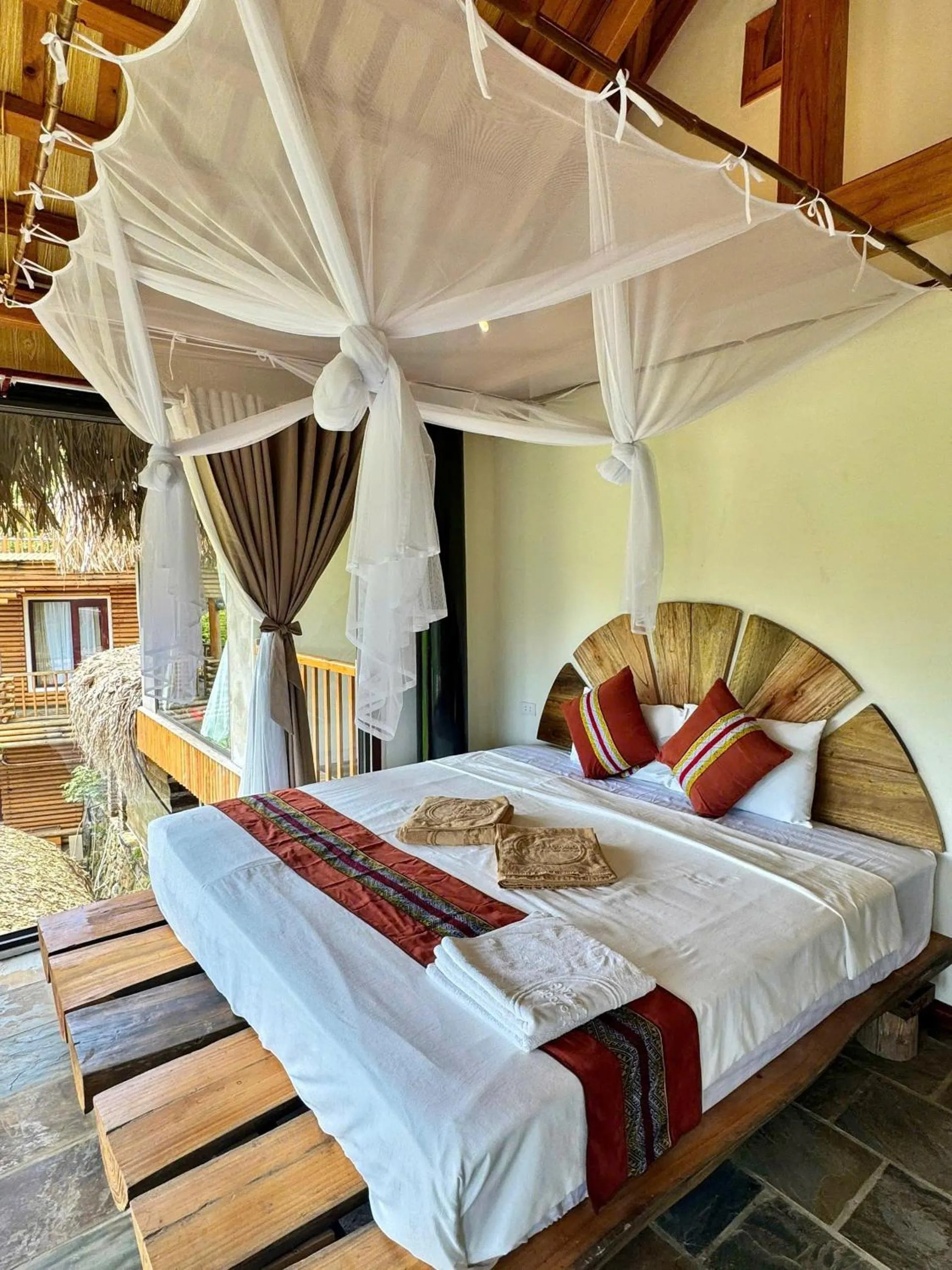 Bed in Pu Luong Jungle Lodge