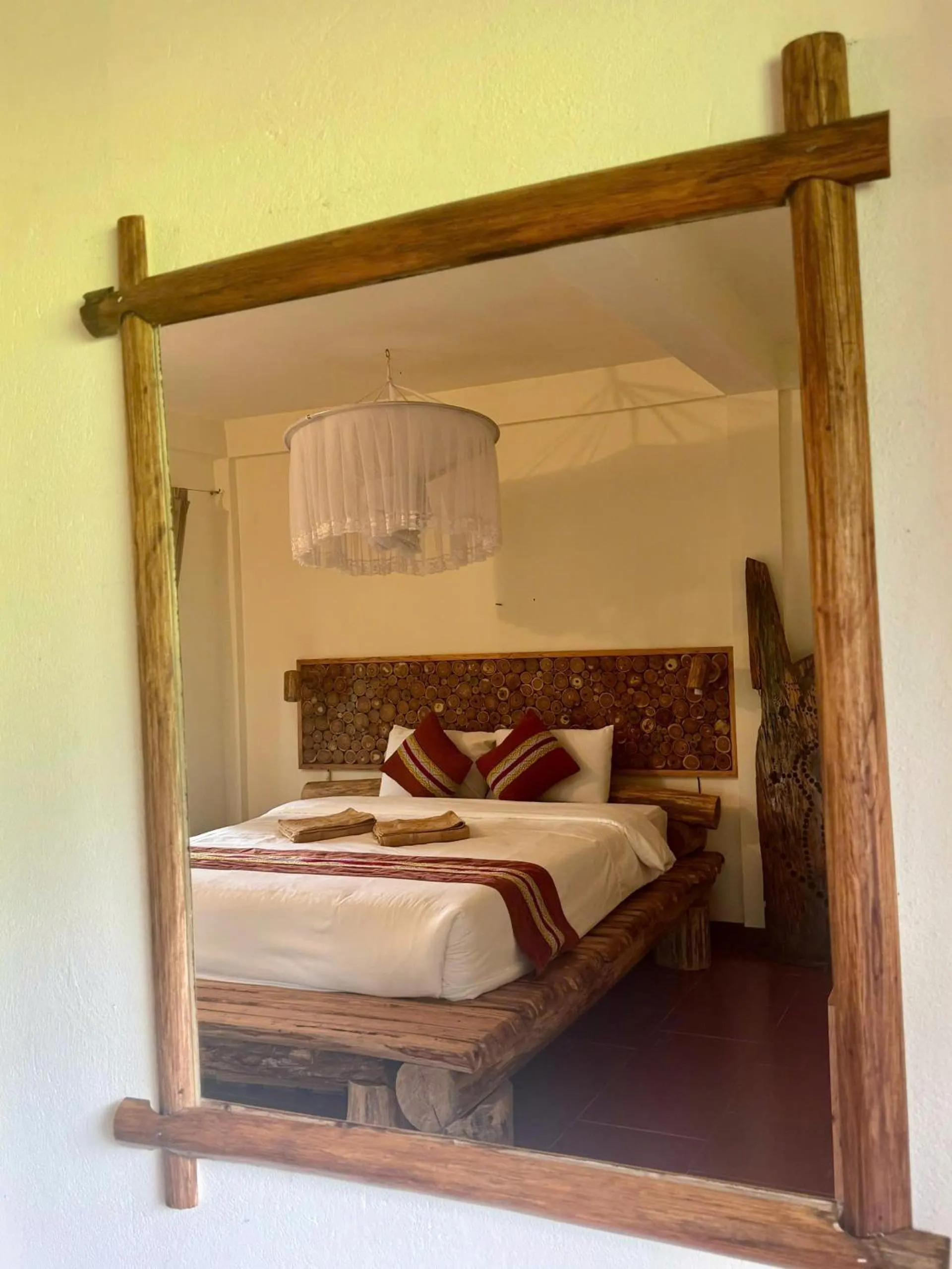 Bed in Pu Luong Jungle Lodge